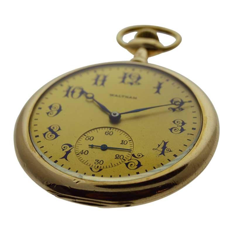 FACTORY / HOUSE: Waltham Watch Company
STYLE / REFERENCE: Open Faced Pocket Watch
METAL / MATERIAL: Yellow Gold Filled
CIRCA / YEAR: 1907
DIMENSIONS / SIZE: 47mm
MOVEMENT / CALIBER: Manual Winding / 17 Jewels 
DIAL / HANDS: Gold Dial with Kiln Fired
