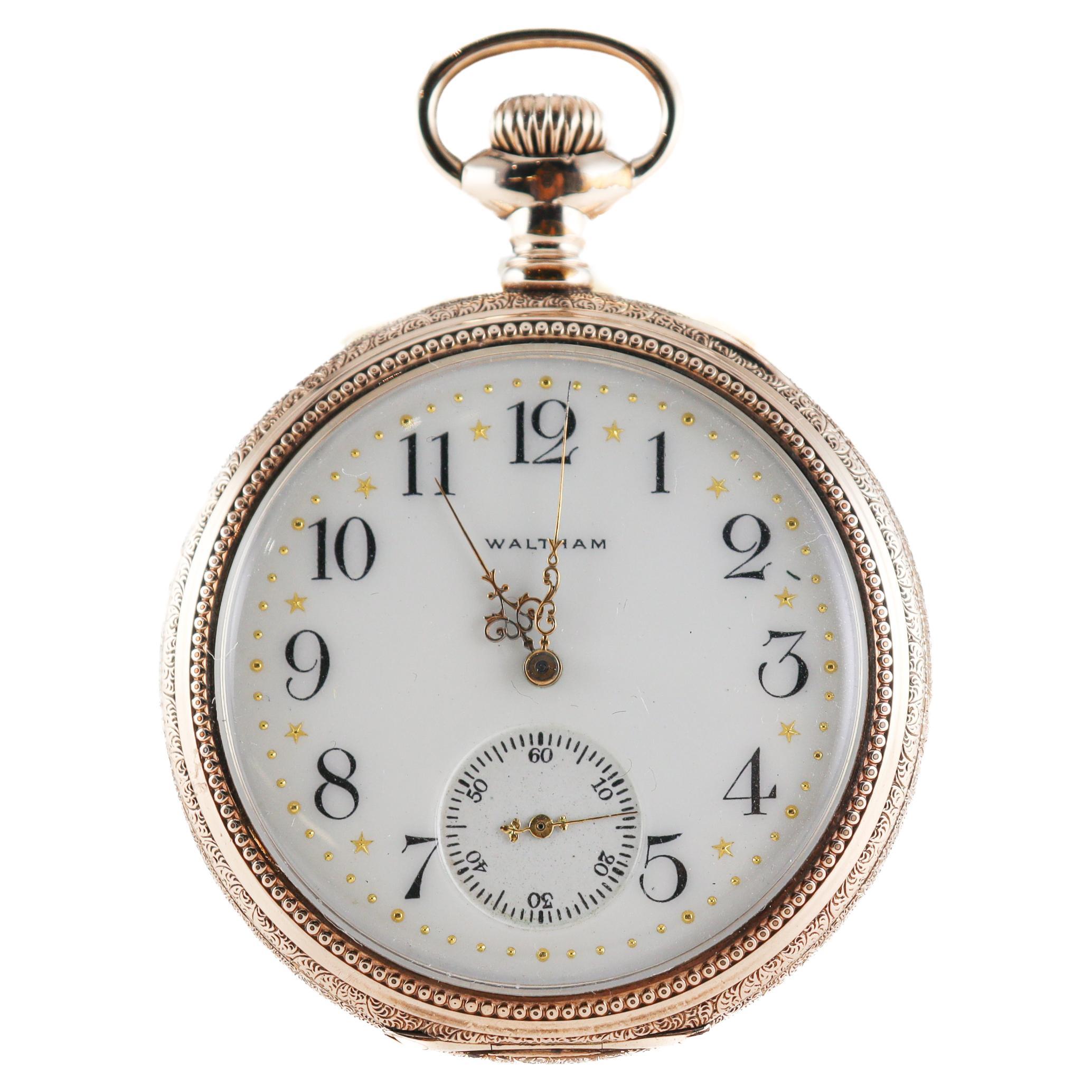 FACTORY / HOUSE: Waltham Watch Company
STYLE / REFERENCE: Open Faced Pocket Watch
METAL / MATERIAL: 14Kt. Yellow Gold Filled
CIRCA / YEAR: 1897
DIMENSIONS / SIZE: 46mm Diameter 
MOVEMENT / CALIBER: Manual Winding / Jewels 17 / Caliber ROYAL
DIAL /