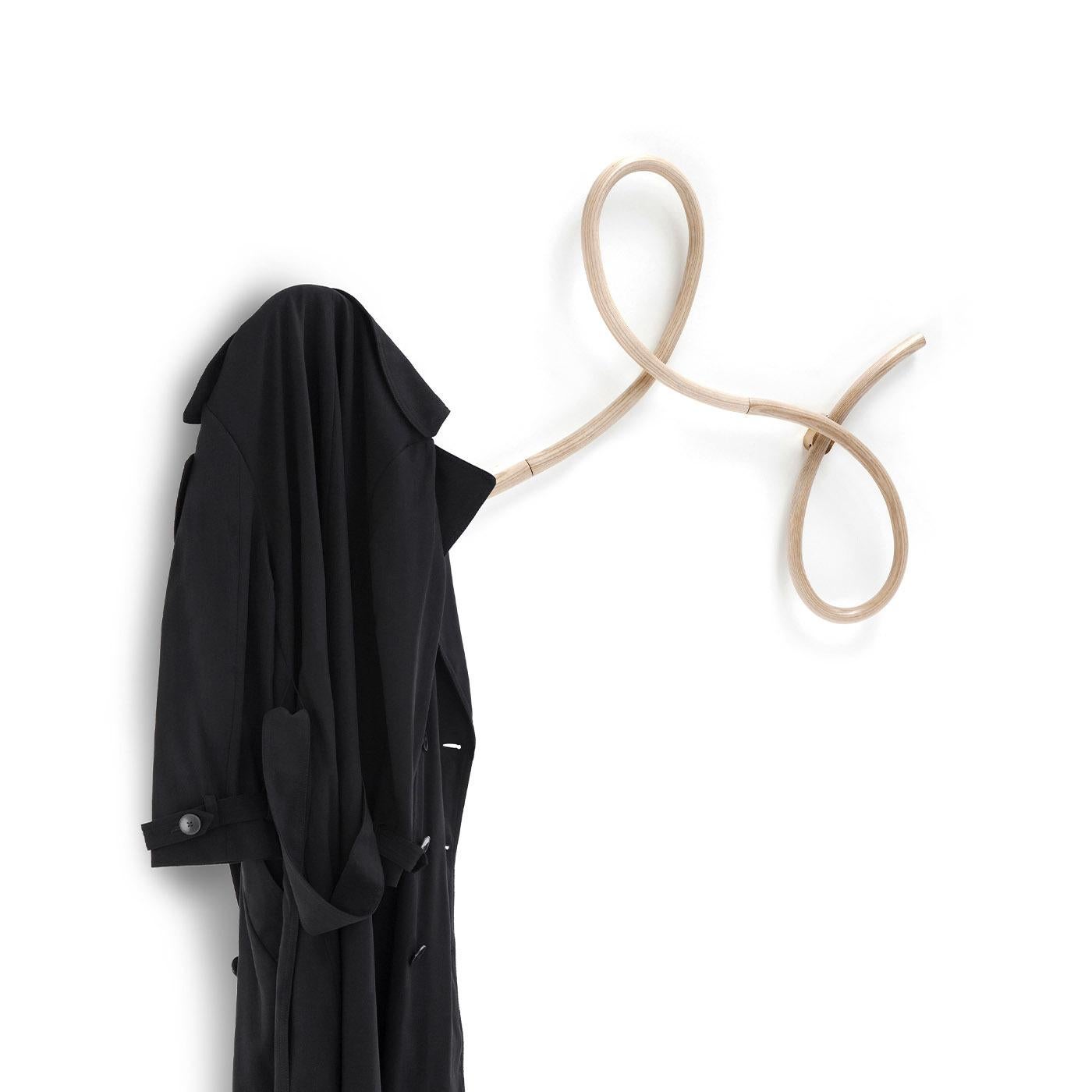 Designed by the Italian-Danish duo GamFratesi who wanted to pay tribute to the Viennese roots of the GTV brand, Waltz is a modular wall coat hanger inspired by the lightness of the steps of the oldest, best-known ballroom dance from which the piece