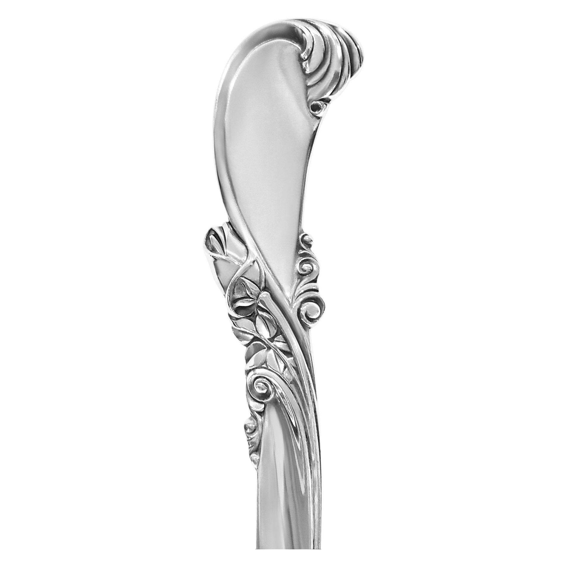 WALTZ OF SPRING Sterling Silver Flatware set by Wallace, patented in 1952. 6 place setting x 12 (minus 4 pieces) with 5 serving pieces. Over 2900 grams sterling silver (93.23 troy ounces). PLACE SETTING: 12 dinner knives (9 3/4)- 12 dinner forks (7