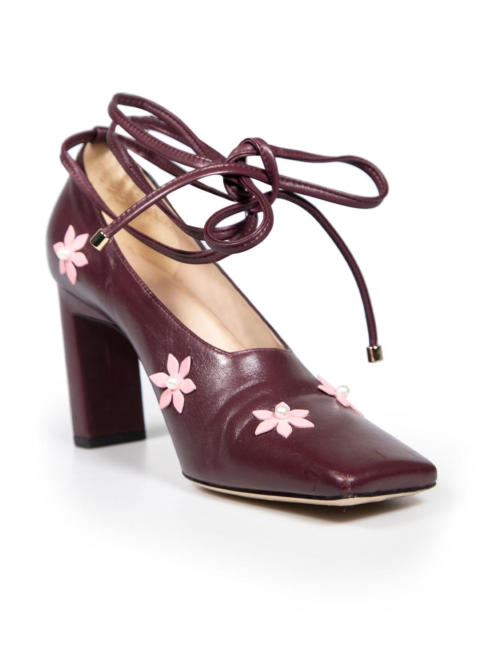 CONDITION is Very good. Minimal wear to shoes is evident. Minimal wear to both shoe toes and the right shoe heel on this used Wandler designer resale item.
 
 Details
 Burgundy
 Leather
 Heels
 Square toe
 Floral embellished
 Mid heel
 Ankle tie