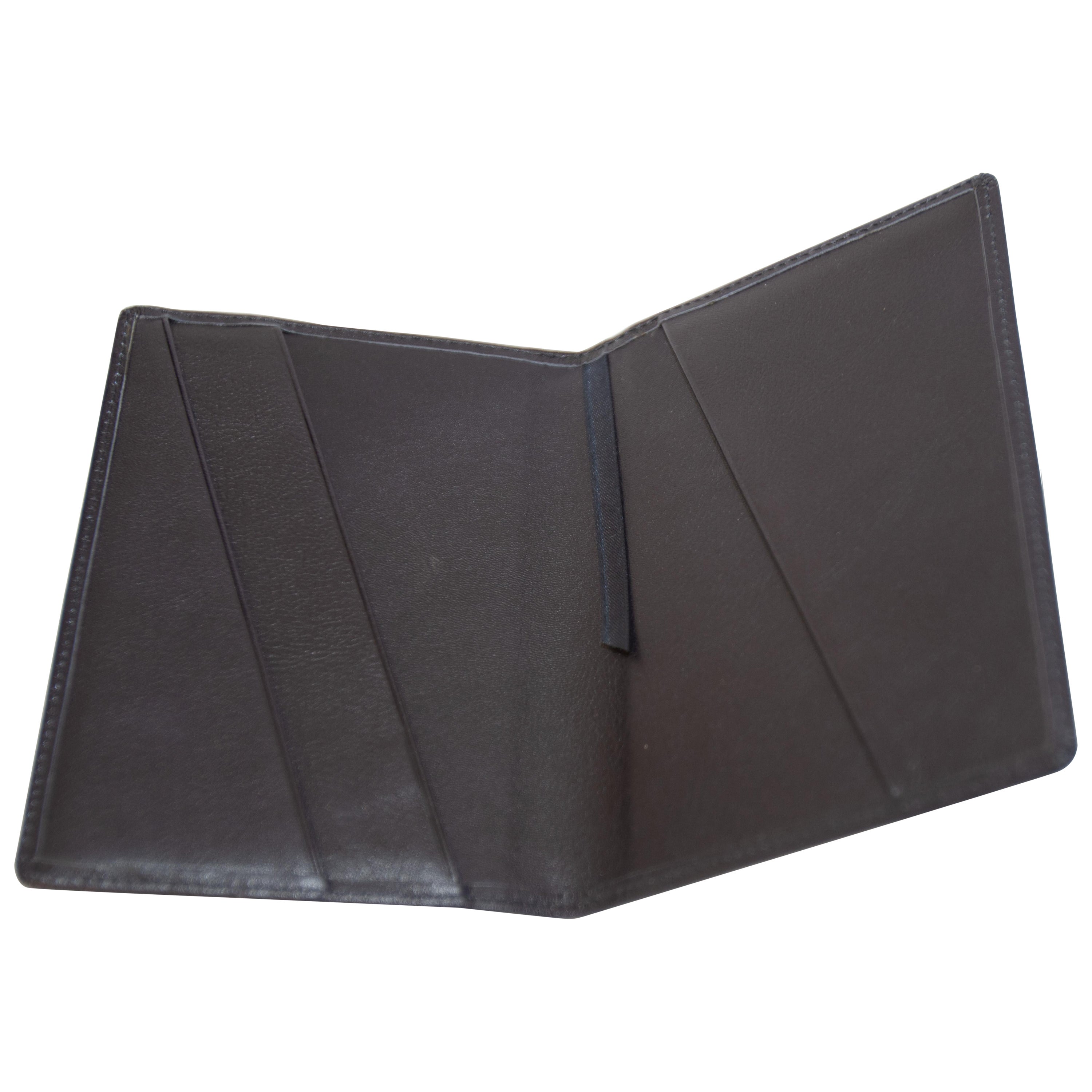 WANT LES ESSENTIELS black leather passport cover designed for airport essentials.
This new leather passport cover is perfect for storing a passport and folded boarding pass.
Made of high-quality, soft and naturally grained leather. 
Stitched edges,