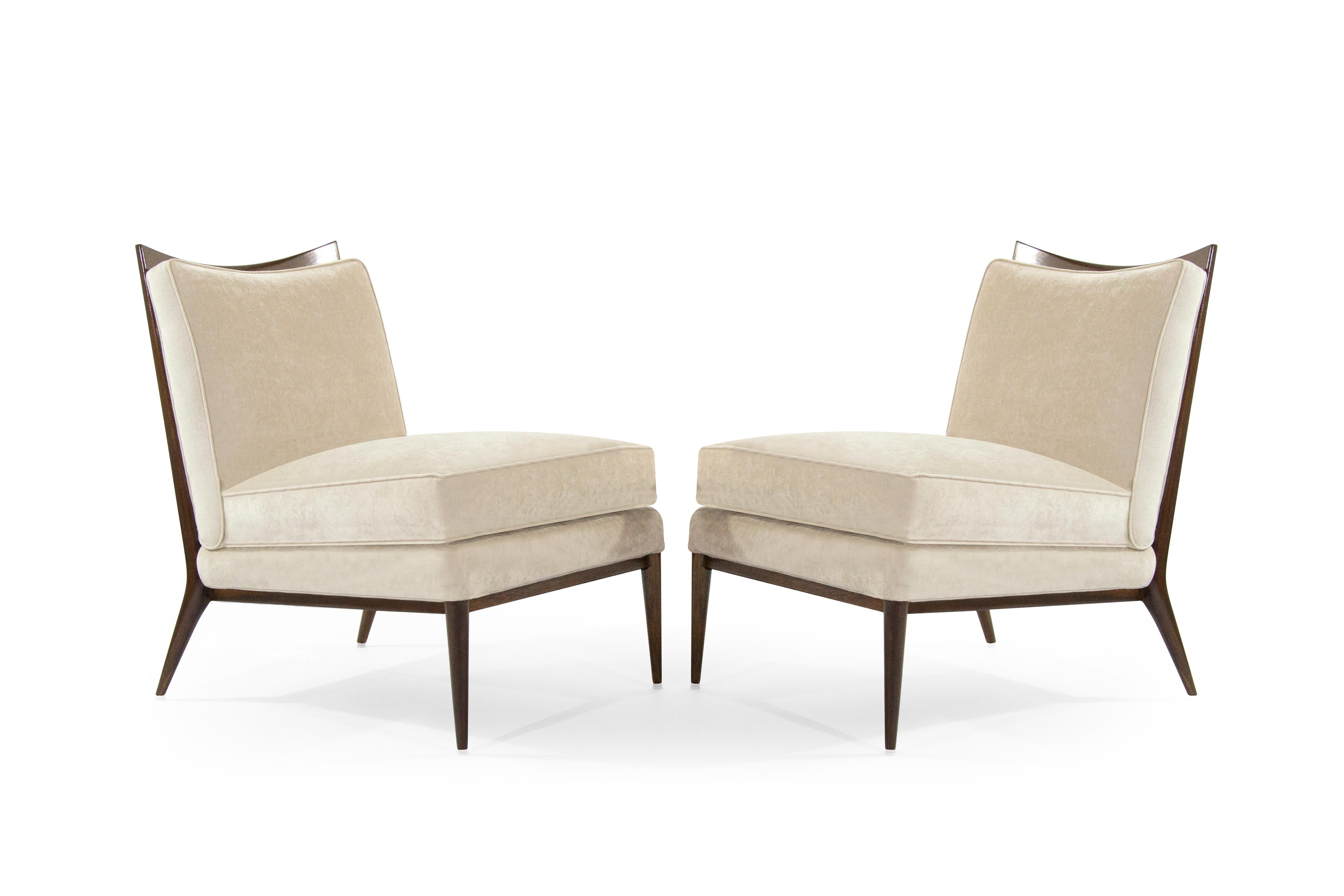 Exceptional pair of chairs designed by Paul McCobb for Directional, circa 1950s.

Newly upholstered in taupe velvet, walnut framed fully restored.