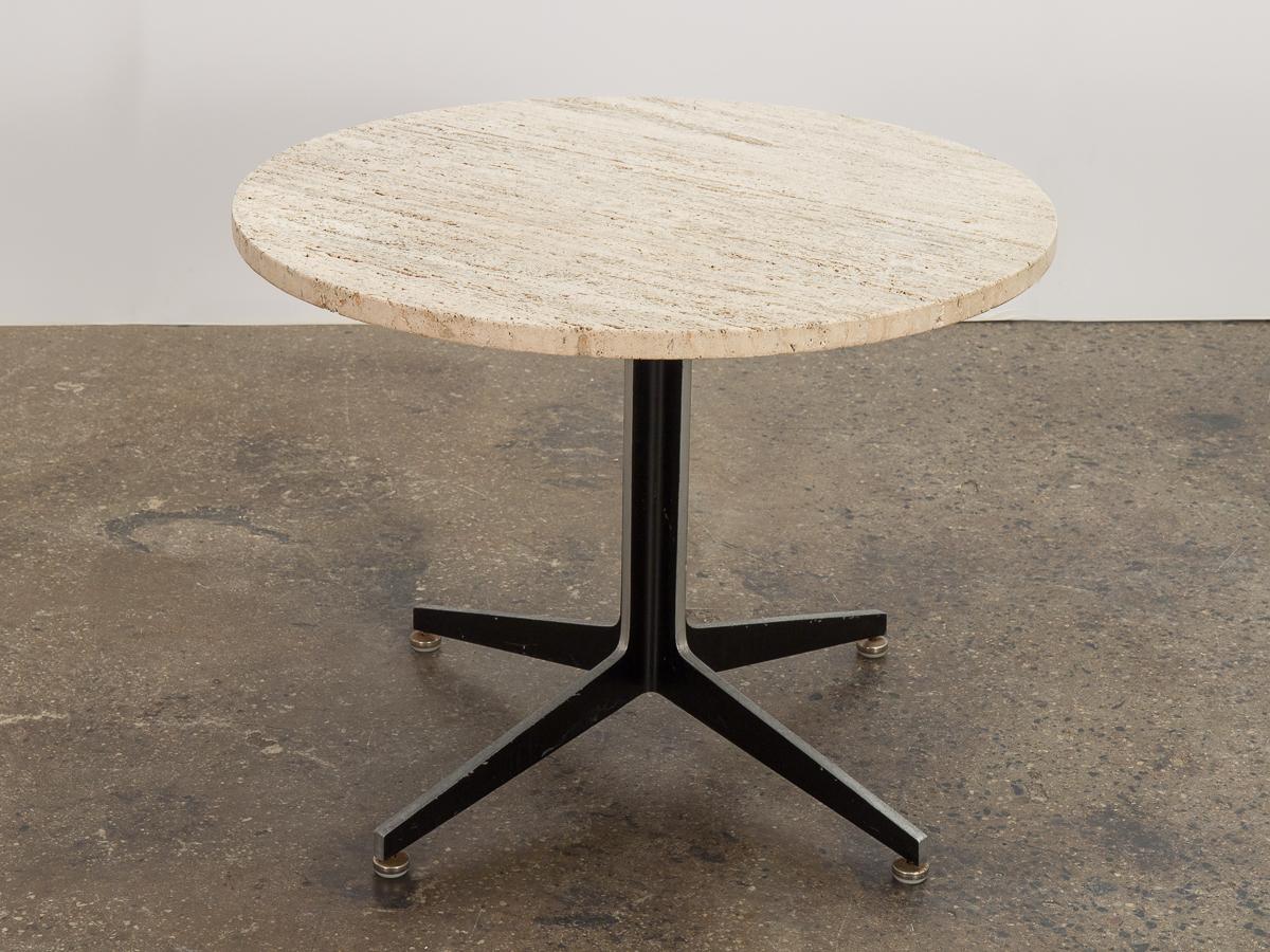 Modernist occasional table, designed by Ward Bennett for Lehigh Furniture. Gorgeous travertine top has a tumbled finish, with the naturally porous surface left intact. A unique look that allows the natural beauty of the stone bring rich texture to