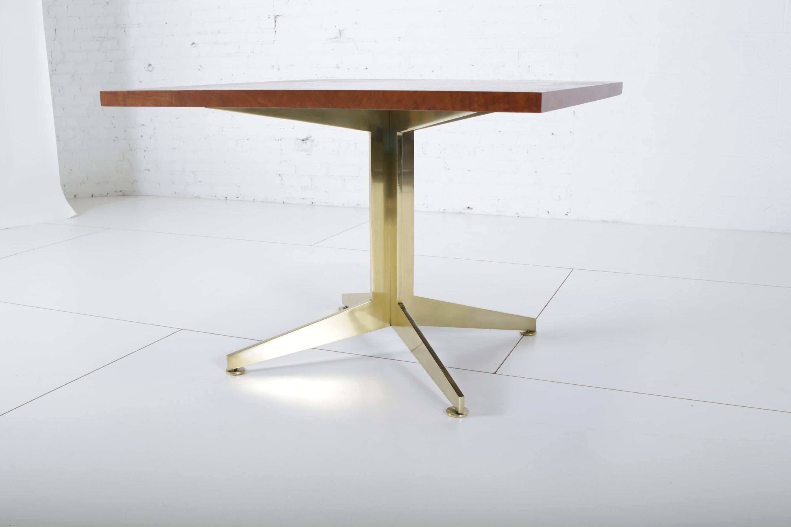 Ward Bennett dining table for Brickel Associates. Fully restored. Polished brass base with refinished burl wood top.
  