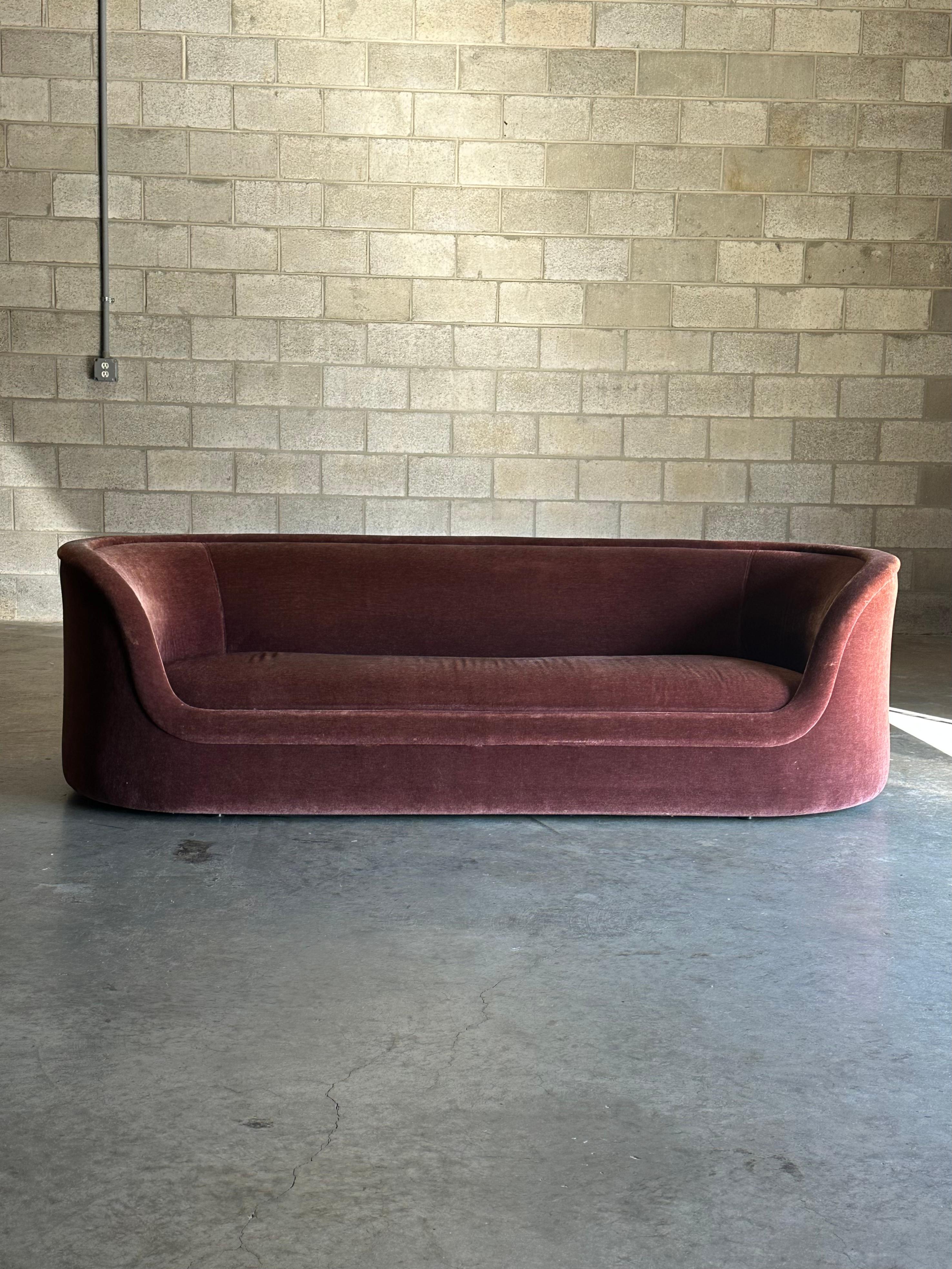 A rare Cartouche sofa by Ward Bennett for Brickel Associates. Sofa features a straight body accentuated by curved sides. Currently upholstered in what appears to be the original mohair. Very low profile yet surprisingly comfortable. 

85