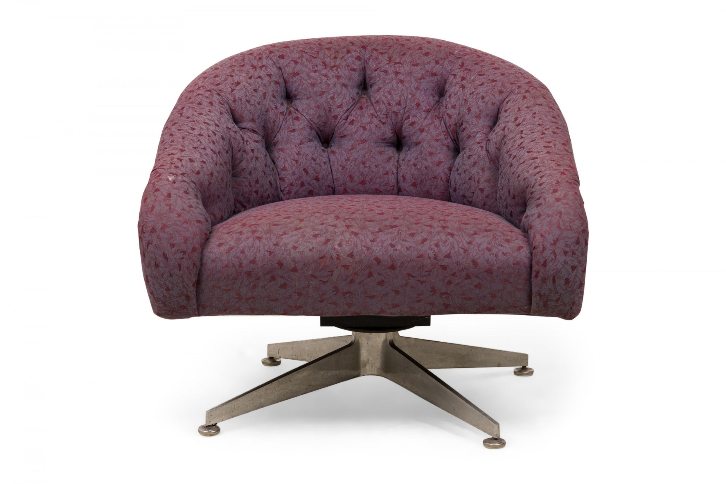 American Mid-Century tub-form swiveling lounge / armchair with lightly patterned purple button tufted fabric upholstery, resting on a four leg brushed chrome pedestal base. (WARD BENNETT)
