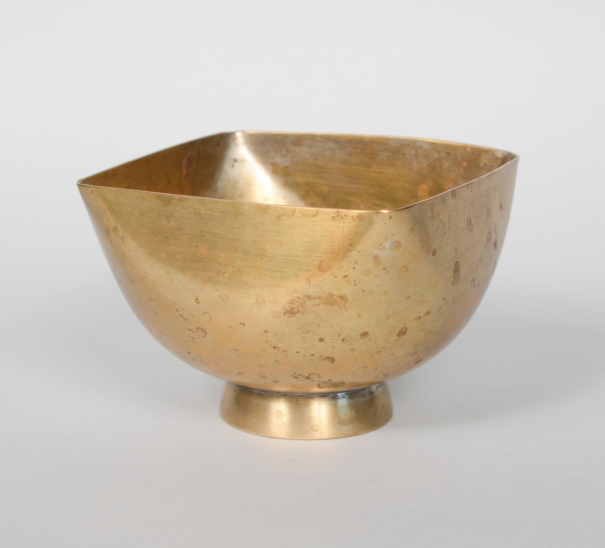 Small bowl designed by Ward Bennett. This bowl was originally silver plated. The silver has mostly worn off and the brass has developed a nice patina.