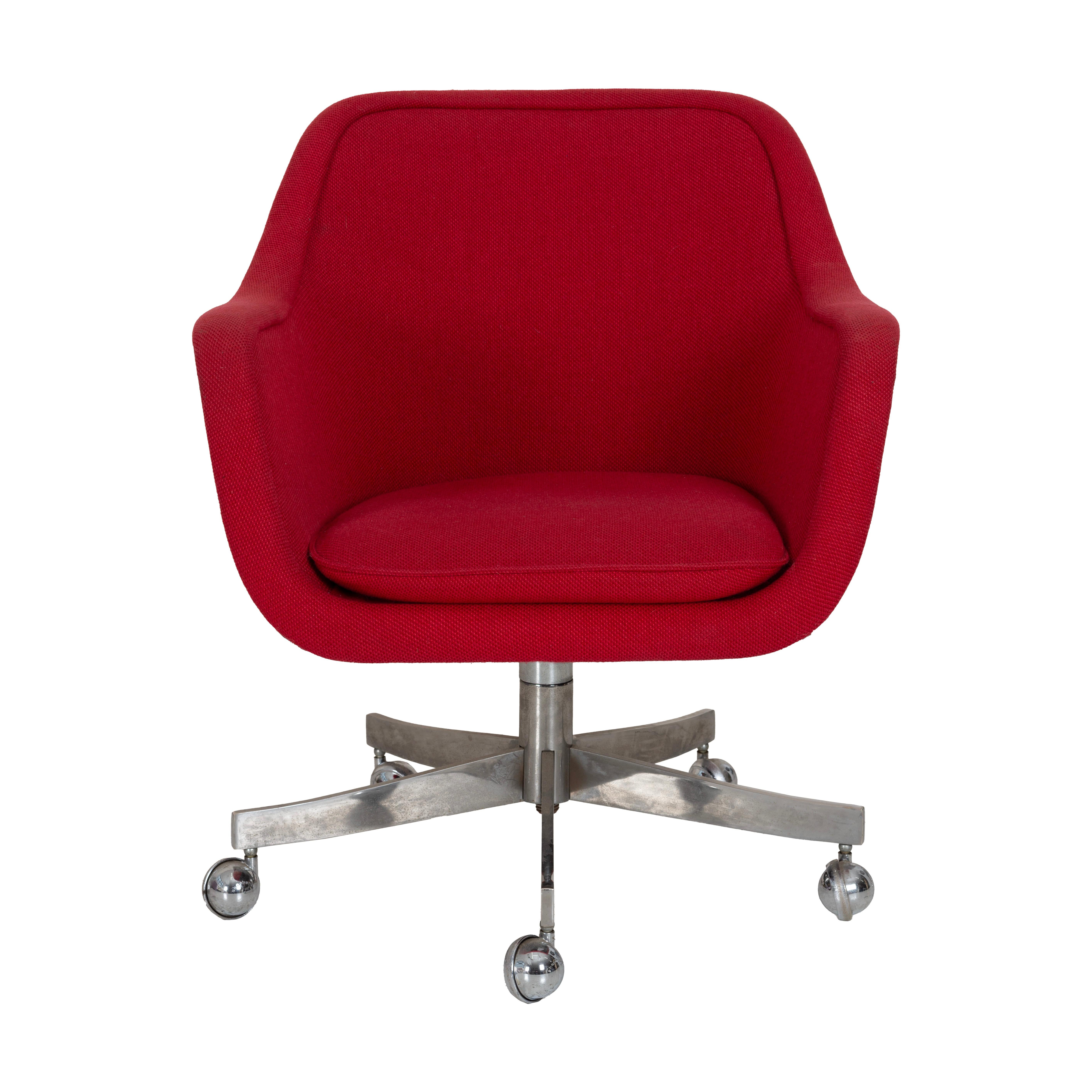 Ward Bennett Desk Chair.  Upholstered in original red cotton weave fabric. Chair tilts and swivels with adjustable height.  Dimensions provided are as follows for its lowest position. it can raise up to 3