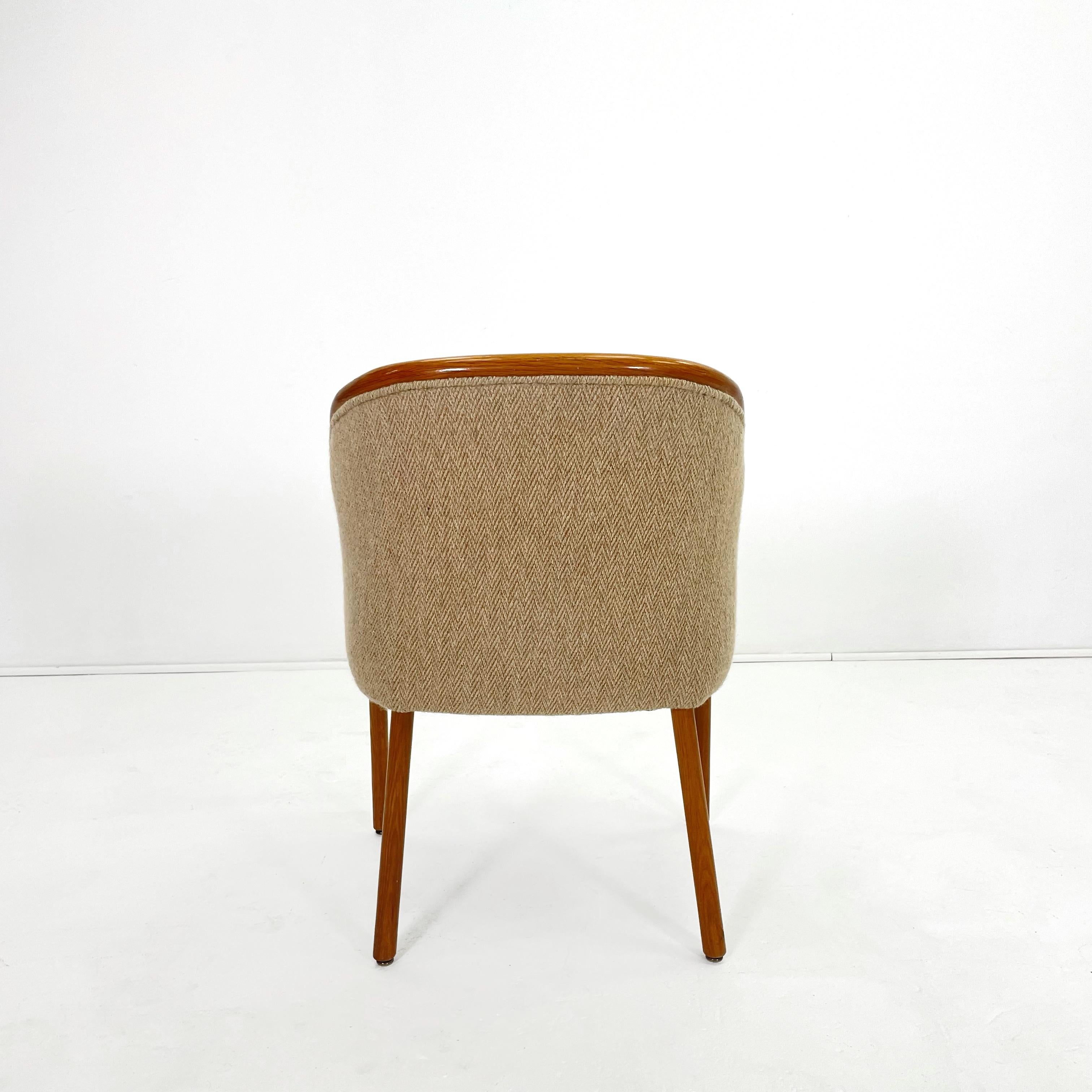 A Banker chair designed by Ward Bennett for Brickel Associates with original beige tweed upholstery.