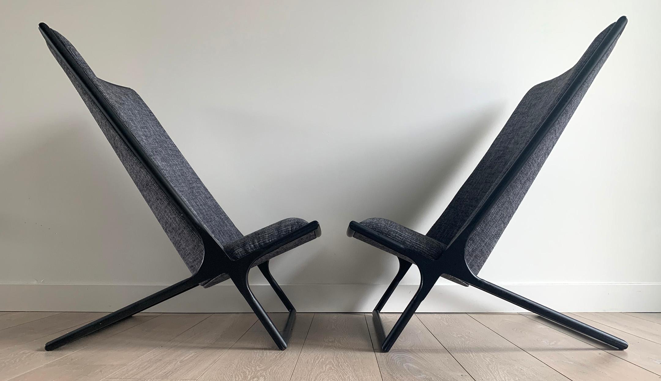 These chairs are simply stunning.  Priced for the pair, a pair of Ward Bennett for Brickel Associates scissor chairs. The chairs are upholstered in a soft, tweed-y looking great fabric with white threading accents. The frames are a striking satin