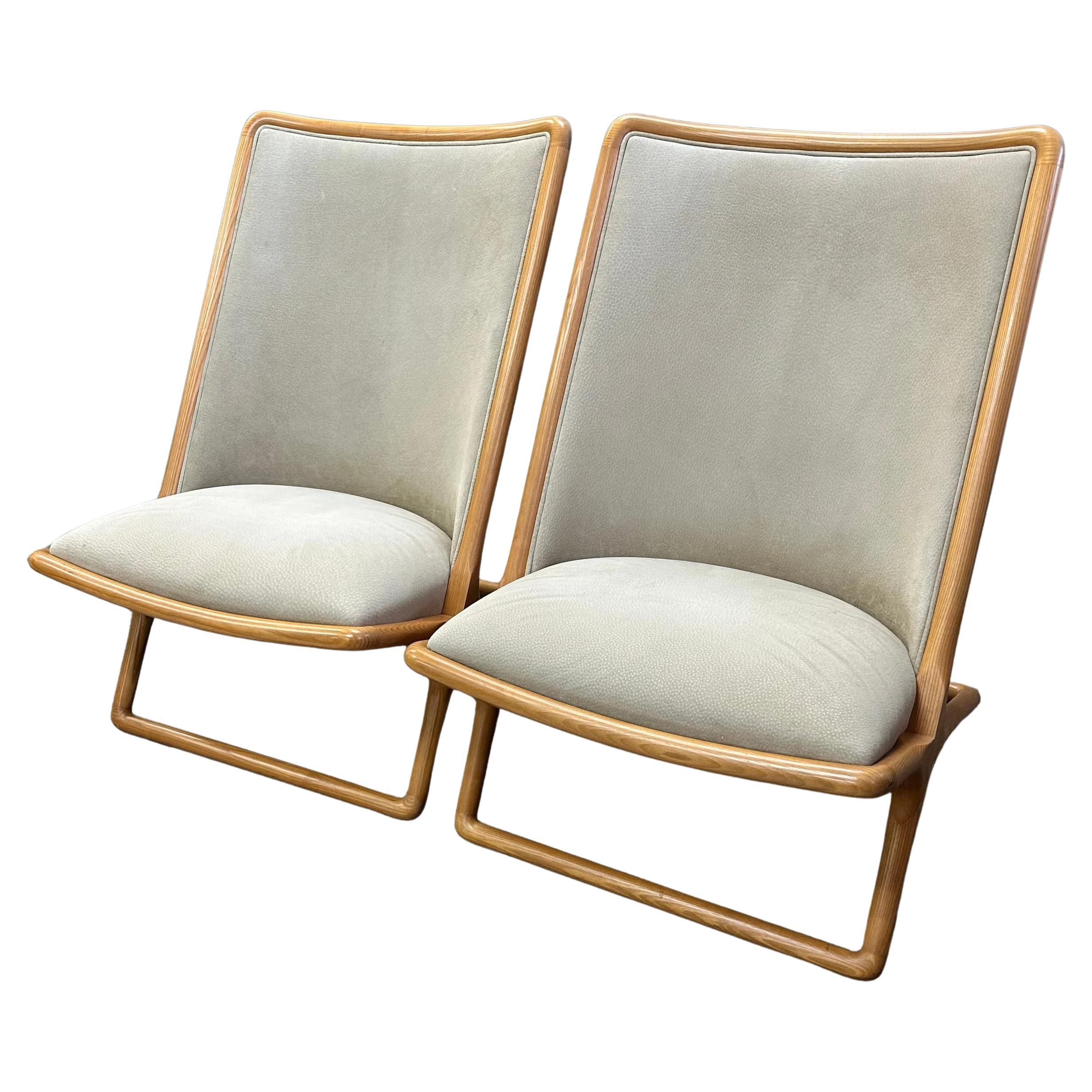 Ward Bennett for Brickel Associates Suede Scissor Chairs, a Pair

The Scissor Lounge Chair was originally conceptualized in 1964 by American artist, designer, and sculptor Ward Bennett for Brickel Associates. Bennett designed the armless chair with