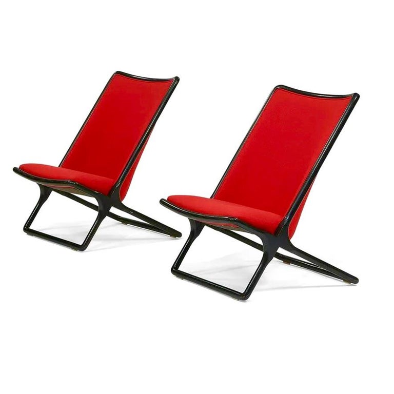 Ward Bennett for Brickel Assoc. Black ash scissor lounge chair pair, set of two, red wool bouclé, 1984, New York. 
Black lacquered ash, red wool upholstery, metal tags to each.
Ward Bennett’s story is a remarkable one. His career began at age 13,