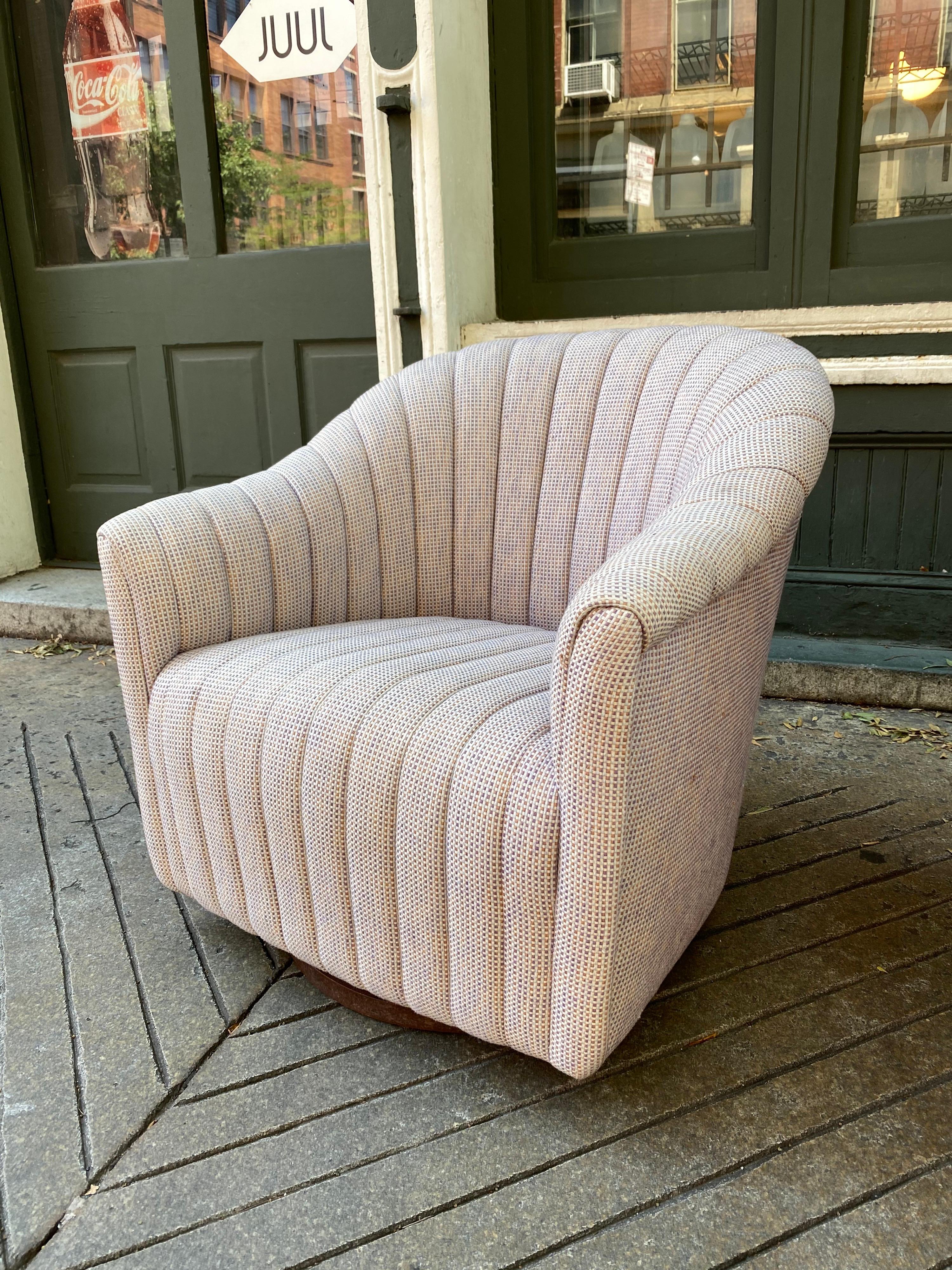 Ward Bennett for Brickel swivel lounge chairs. Chairs are covered in a Jack Lenor Lawsen Fabric which is in pretty good shape. Chairs have original tags which date them to 1990, although this chair design dates to the 1960's. Sleek side profile and