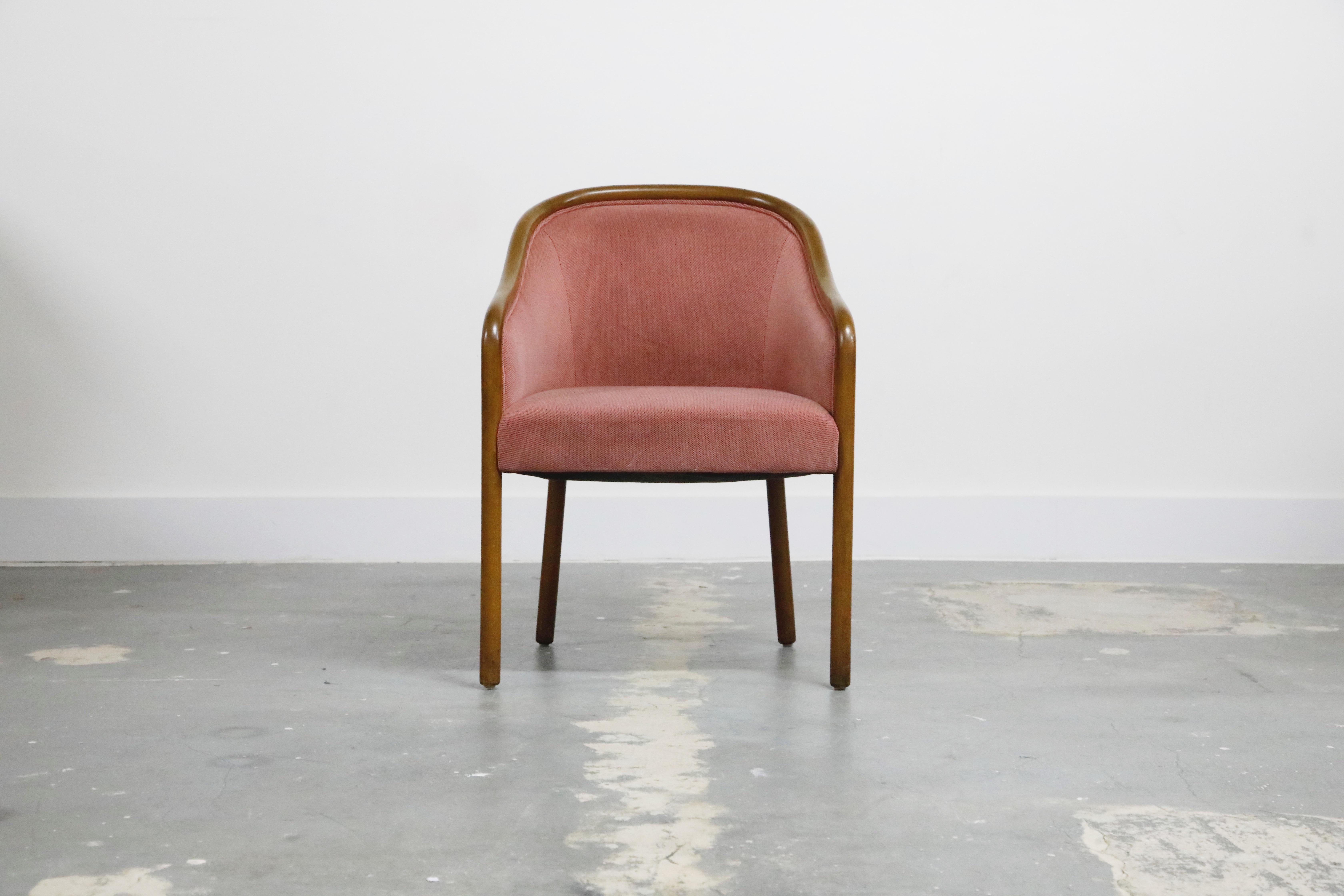 Set of six Ward Bennett dining armchairs for Brickel Associates, circa 1970s. These curvaceous arm chairs are upholstered in sumptuous pink velvet and edged in walnut and supported by walnut legs. Classic design and style, excellent option for