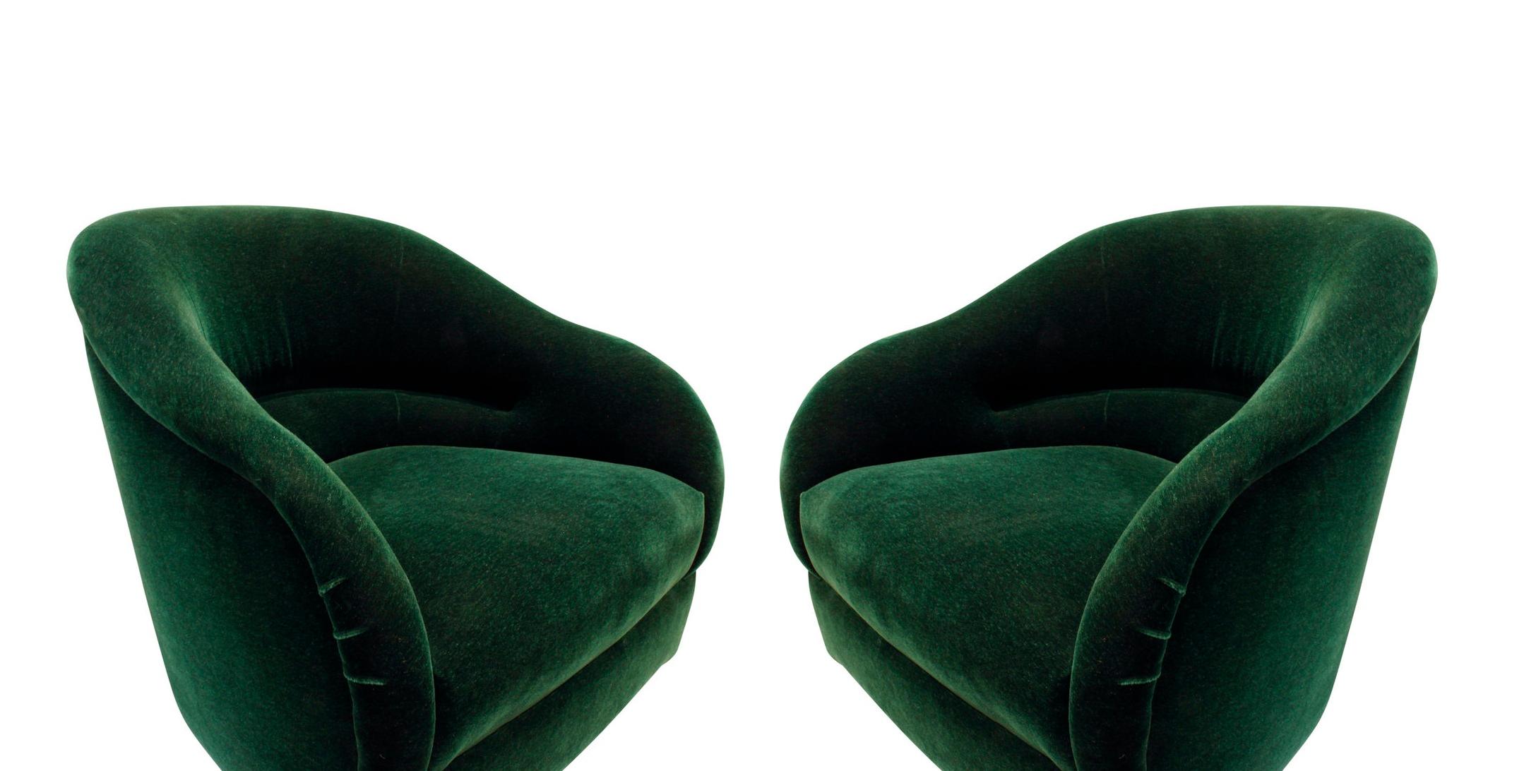 Sleek and sculptural pair of rarely offered Ward Bennett lounge chairs in green velvet upholstery.