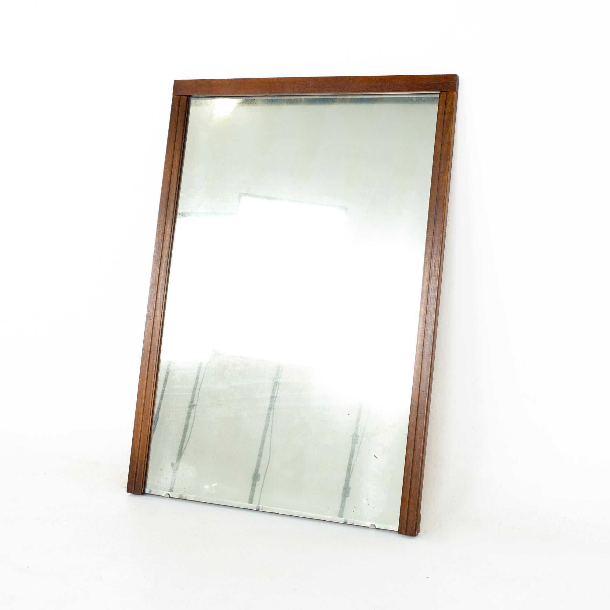 Ward furniture company mid century walnut mirror.
Mirror measures: 26 wide x 1 deep x 37 inches high

All pieces of furniture can be had in what we call restored vintage condition. That means the piece is restored upon purchase so it’s free of