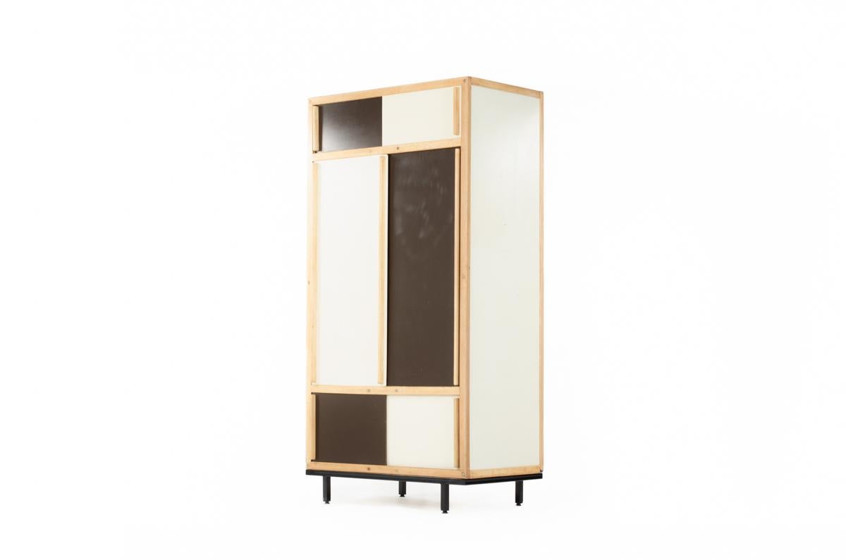 Wardrobe by Andre Sornay in the 60s
Base in metal (new), structure in mahogany with tigette system, panels in off-white and black lacquer (all from origin)
Inside shelves (new) on the left, wardrobe space on the right
Many traces of time on the