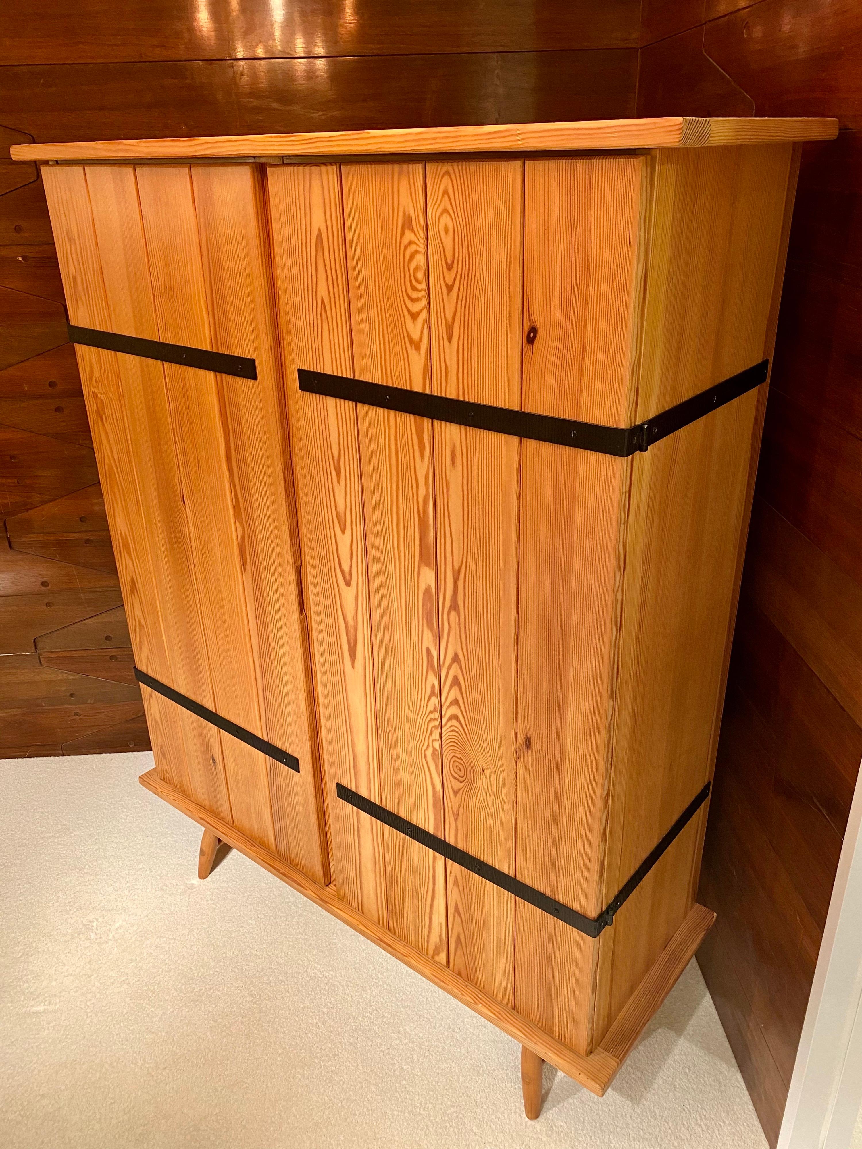 Cabinet in pine and black lacquered wrought iron, France 1960's.