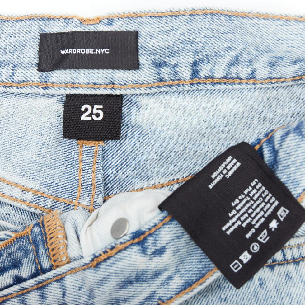 WARDROBE NYC stone wash blue leather tag mid denim shorts 25