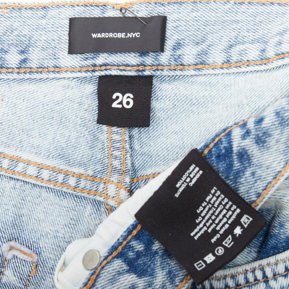 WARDROBE NYC  stone wash blue leather tag mid denim shorts 26