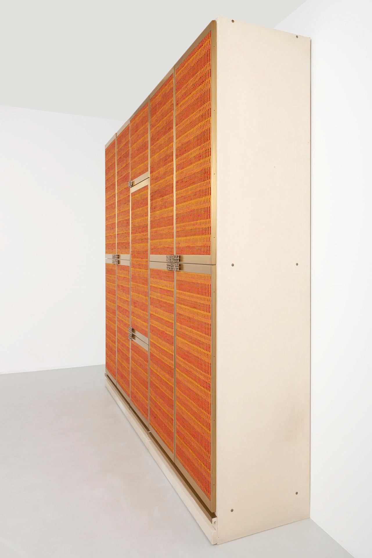 Italian made wardrobe with bronze handles, by Luciano Frigerio.