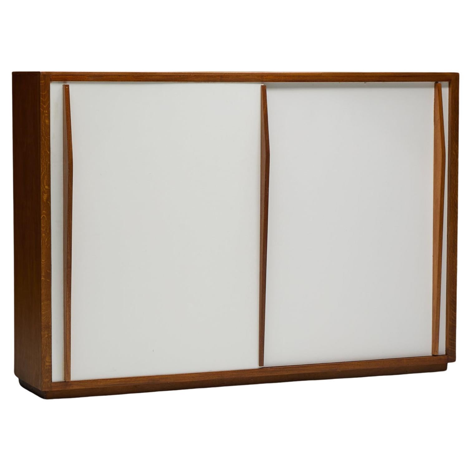 Wardrobe by Charlotte Perriand 
Atelier Jean Prouvé, France, 1950s For Sale