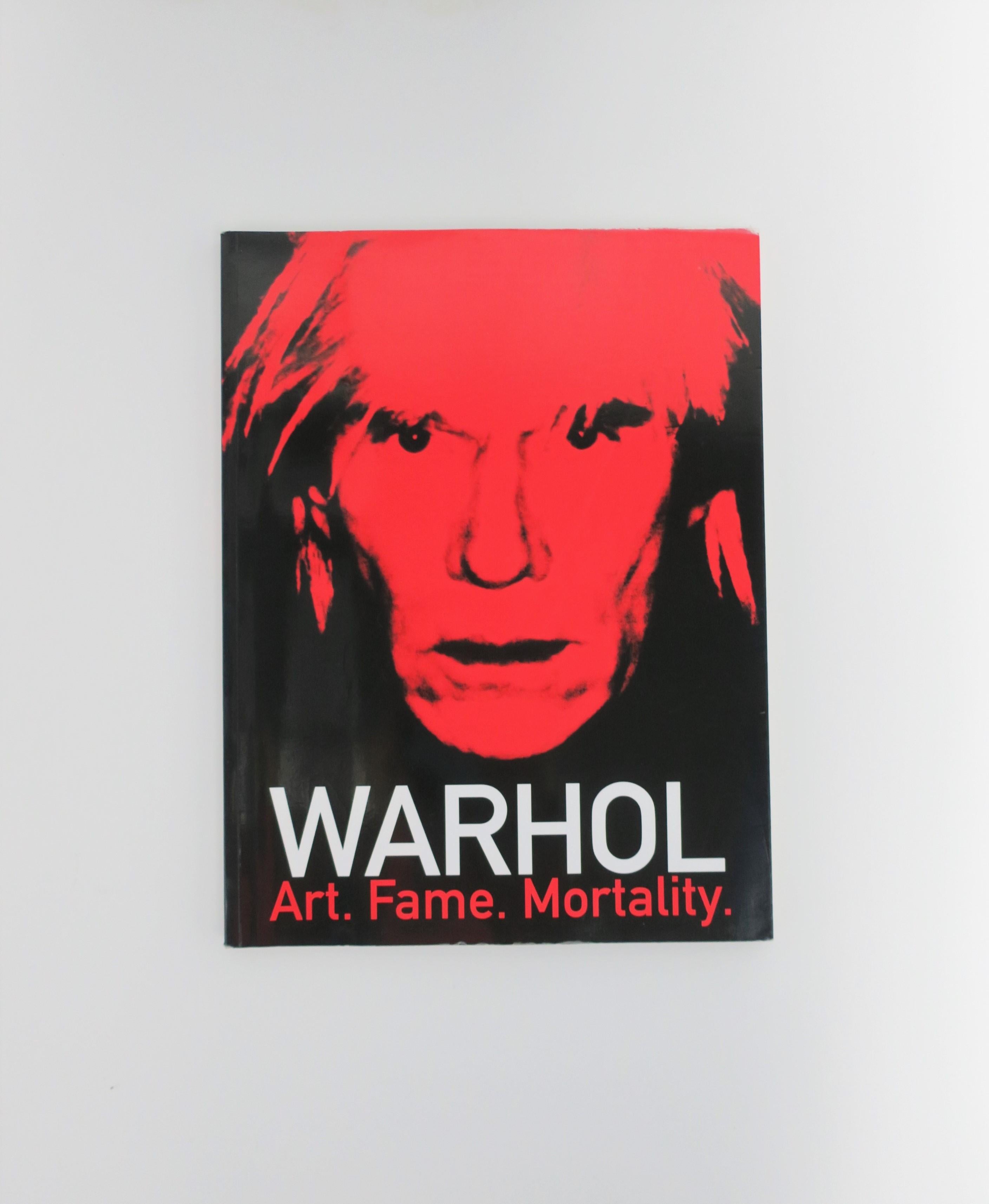 An early 21st century 'Warhol: Art. Fame. Mortality.' exhibition book by The Dali Museum, St. Petersburg, FL, 2014. This book was published on the occasion of the exhibition 'Warhol: Art. Fame. Mortality.', The Dali Museum, January 18, 2014 - April