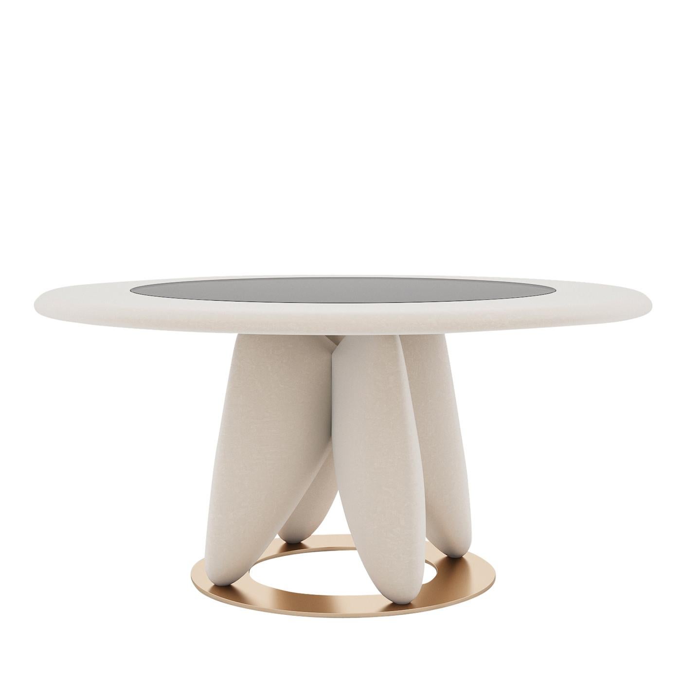 Distinguished by an exquisitely modern design, this wooden dining table is a stunning exercise of geometric balance. Its white-lacquered components (part of the top and legs) delicately complement the round gold-finished metal ring that functions as