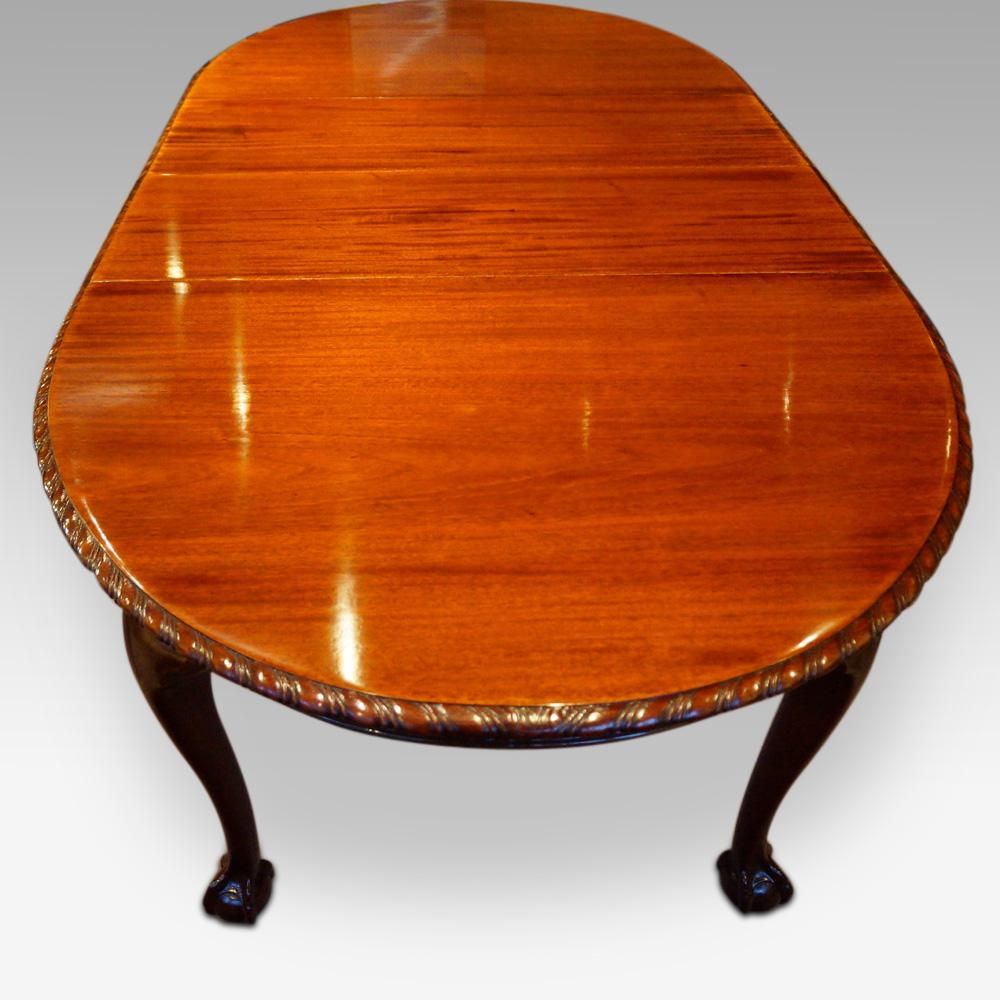 English Waring and Gillow Mahogany Extending Dining Table For Sale