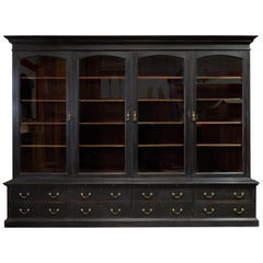 Antique Waring & Gillows Glazed Ebonised Mahogany Bookcase