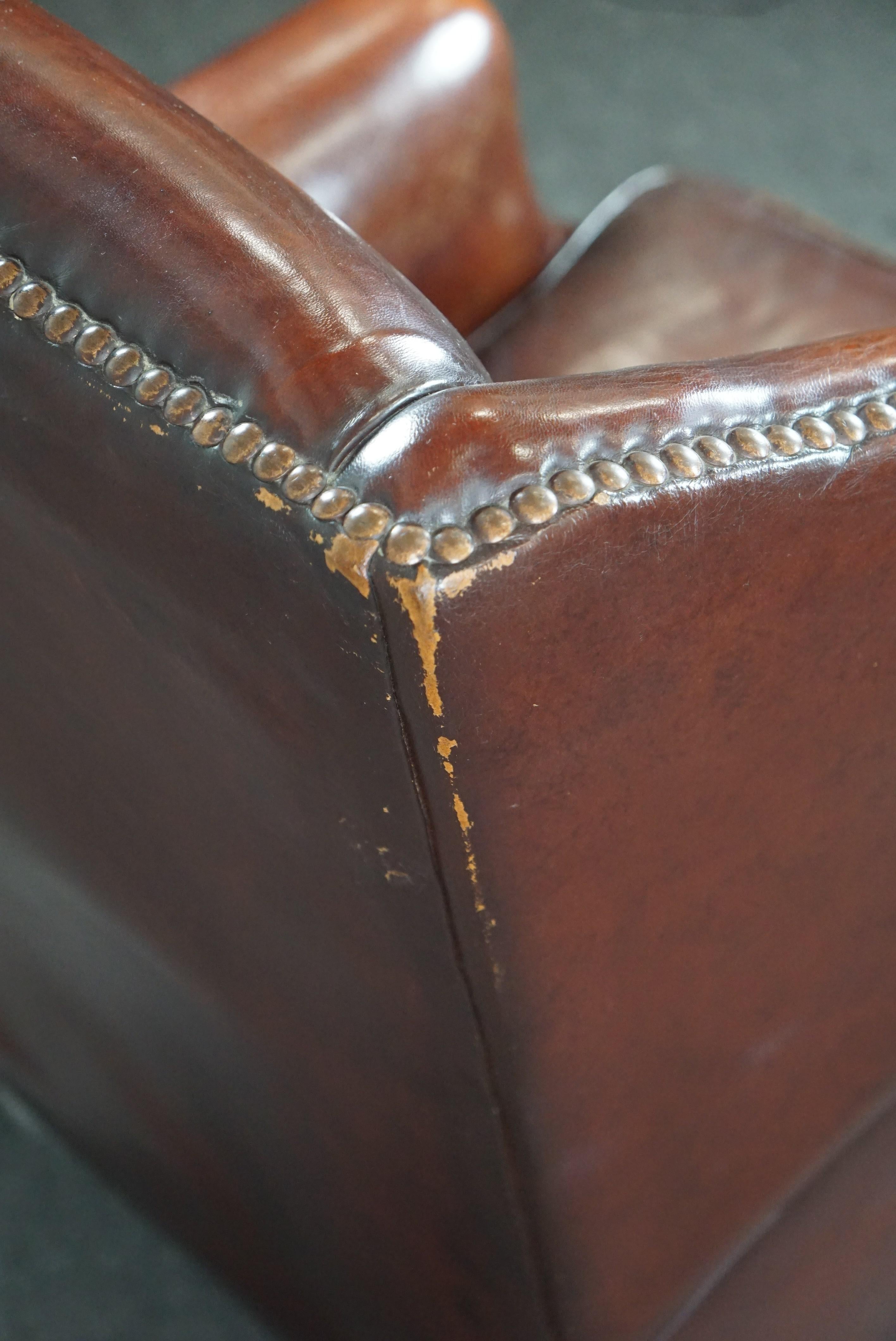 Warm brown sheep leather wing chair with character For Sale 5