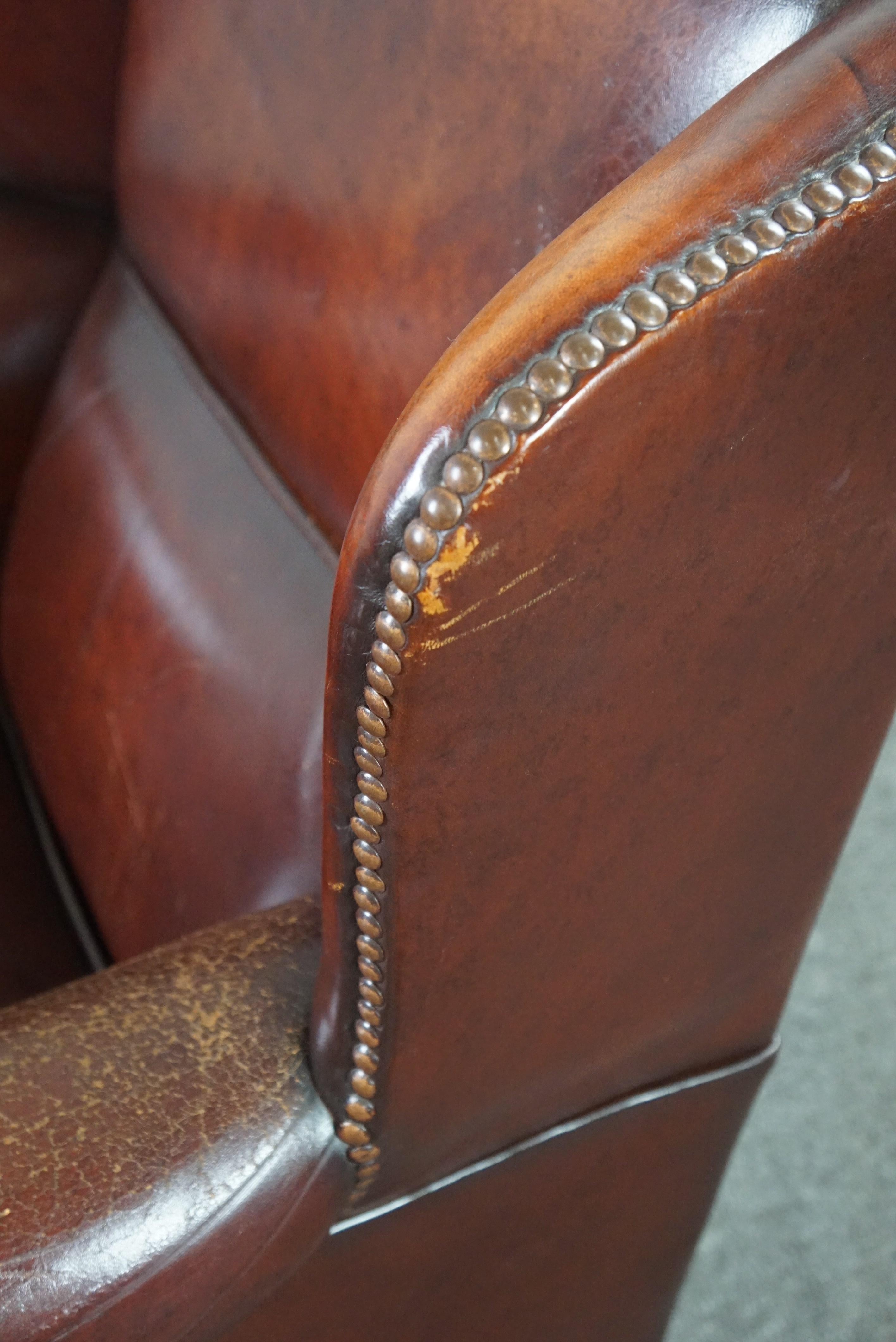 Warm brown sheep leather wing chair with character For Sale 2