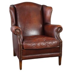 Warm-colored sheepskin leather armchair