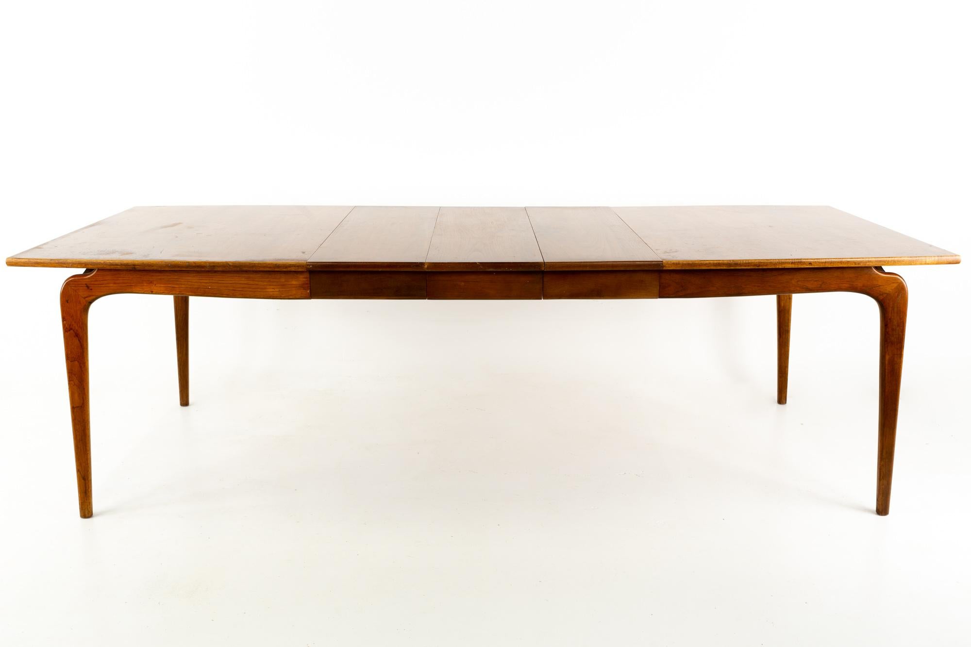 Warren church for Lane perception midcentury 10 person walnut surfboard dining table
This table is 81.5 wide x 42 deep x 29 inches high, and each of the 3 leaves are 12 wide with a chair clearance of 24 inches

All pieces of furniture can be had