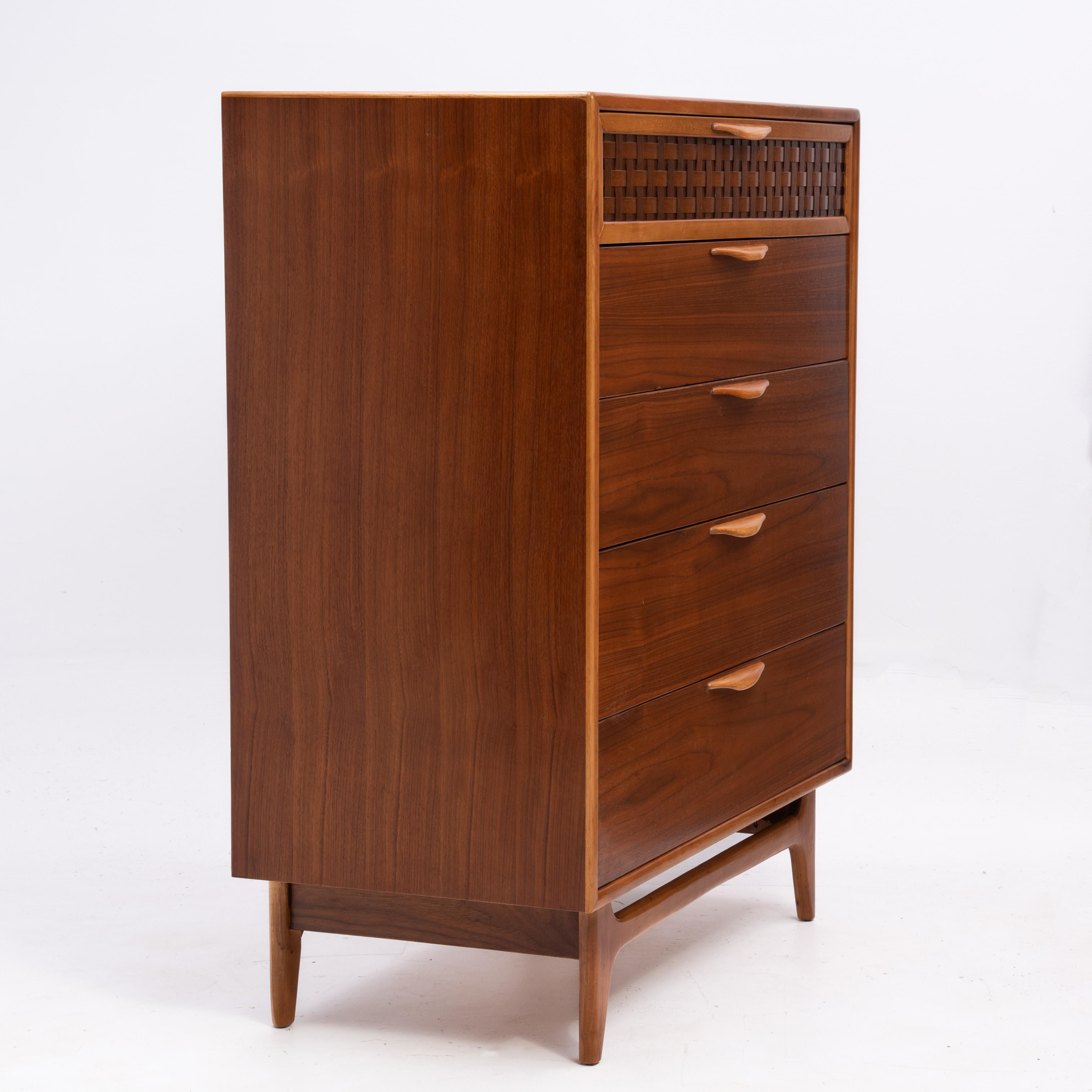 Warren Church for Lane Perception walnut, mahogany and oak Mid Century tall chest or dresser with a wonderful contrasting basketweave detail on the top drawer.

The depth of the top is actually 19 inches. 20 inches includes the handles.