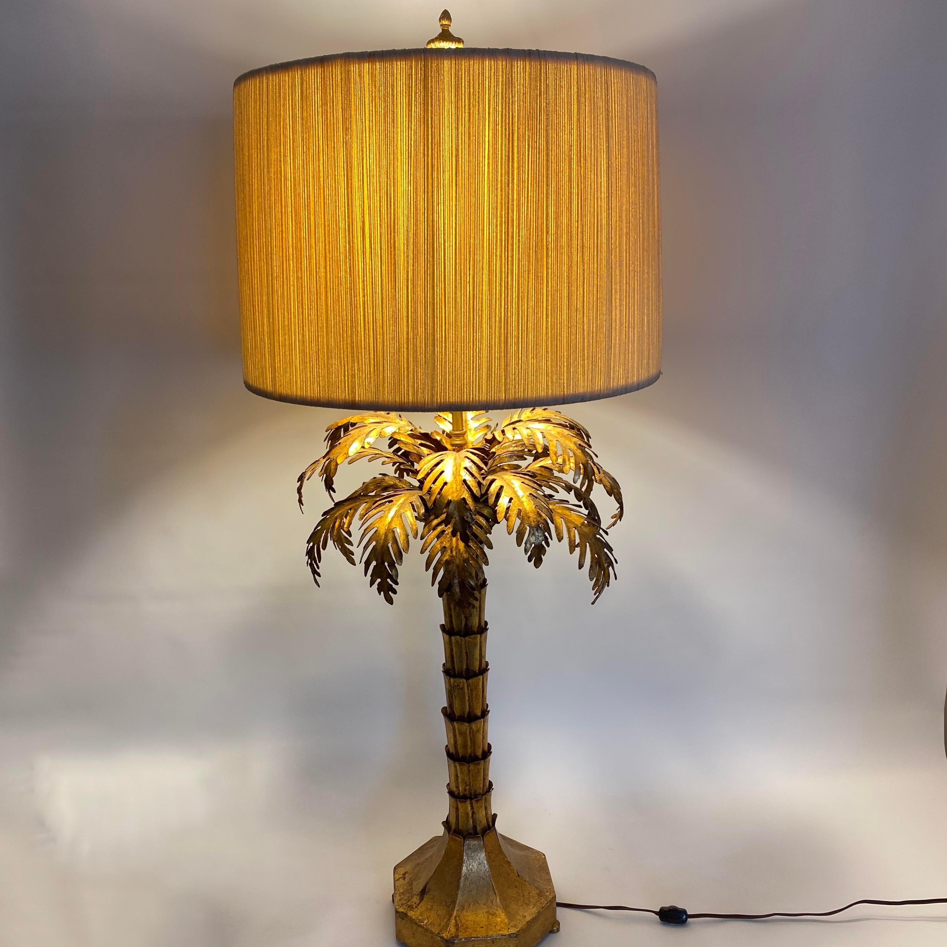 Stunning mid 1950s Warren Kessler metal palm tree lamp with original string shade. Could be used with current shade or updated. Excellent vintage condition. Shade measures: 17.25” x 12” high. Measurements listed are from finial to base top to bottom