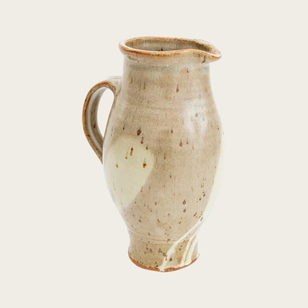 1960's, USA. Speckled light grey glaze vase with modernist form and grand scale. Marked by the Artist with a stamp below the handle.  Warren MacKenzie (1924 - 2018) was known for modernist wheel-thrown functional pottery influenced by Bernard Leach