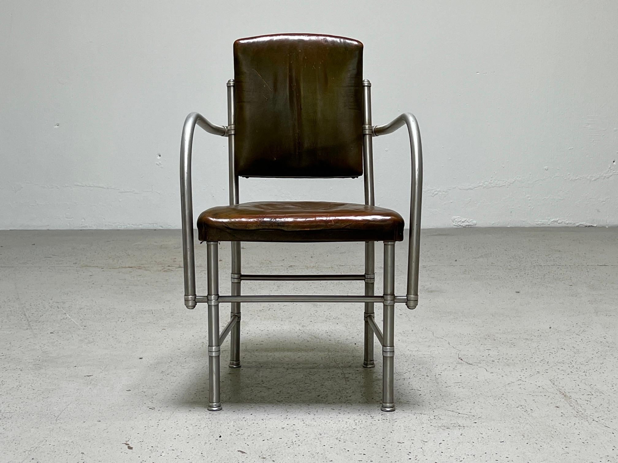 A beautifully patinated leather and aluminum armchair designed by Warren McArthur, 1930's.