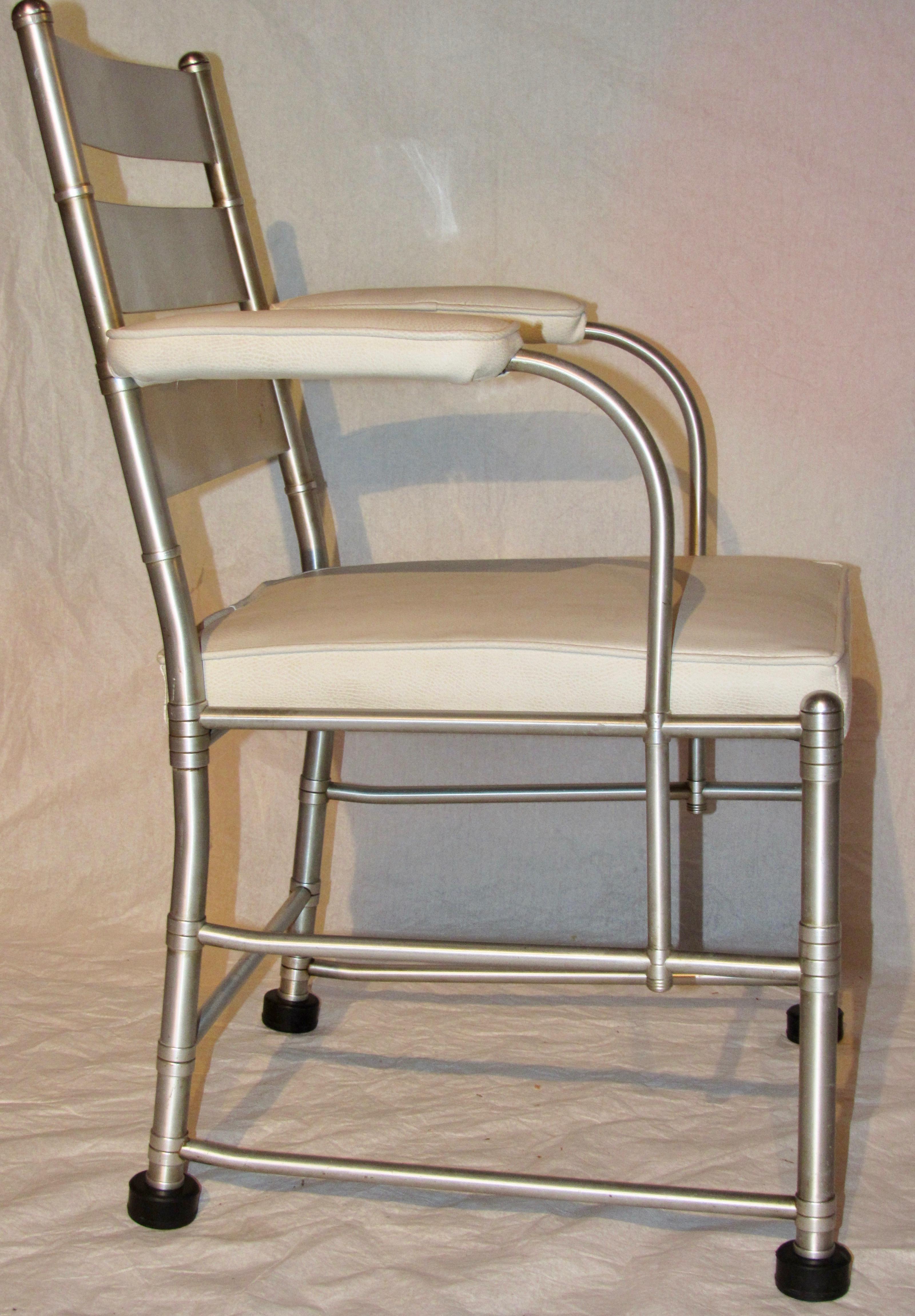 A Warren McArthur armchair from the early to mid-1930s has an anodized aluminum frame. Titled 