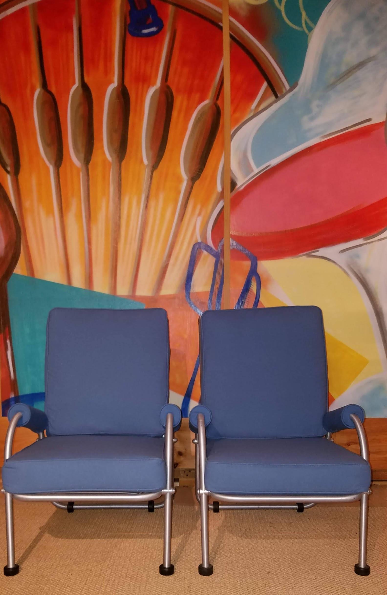Warren McArthur suite of four lounge chairs circa late 1930s. These seldom seen examples retain their original finish to their tubular aluminum frames. They have been newly upholstered in a blue duck as originally offered by Warren McArthur and