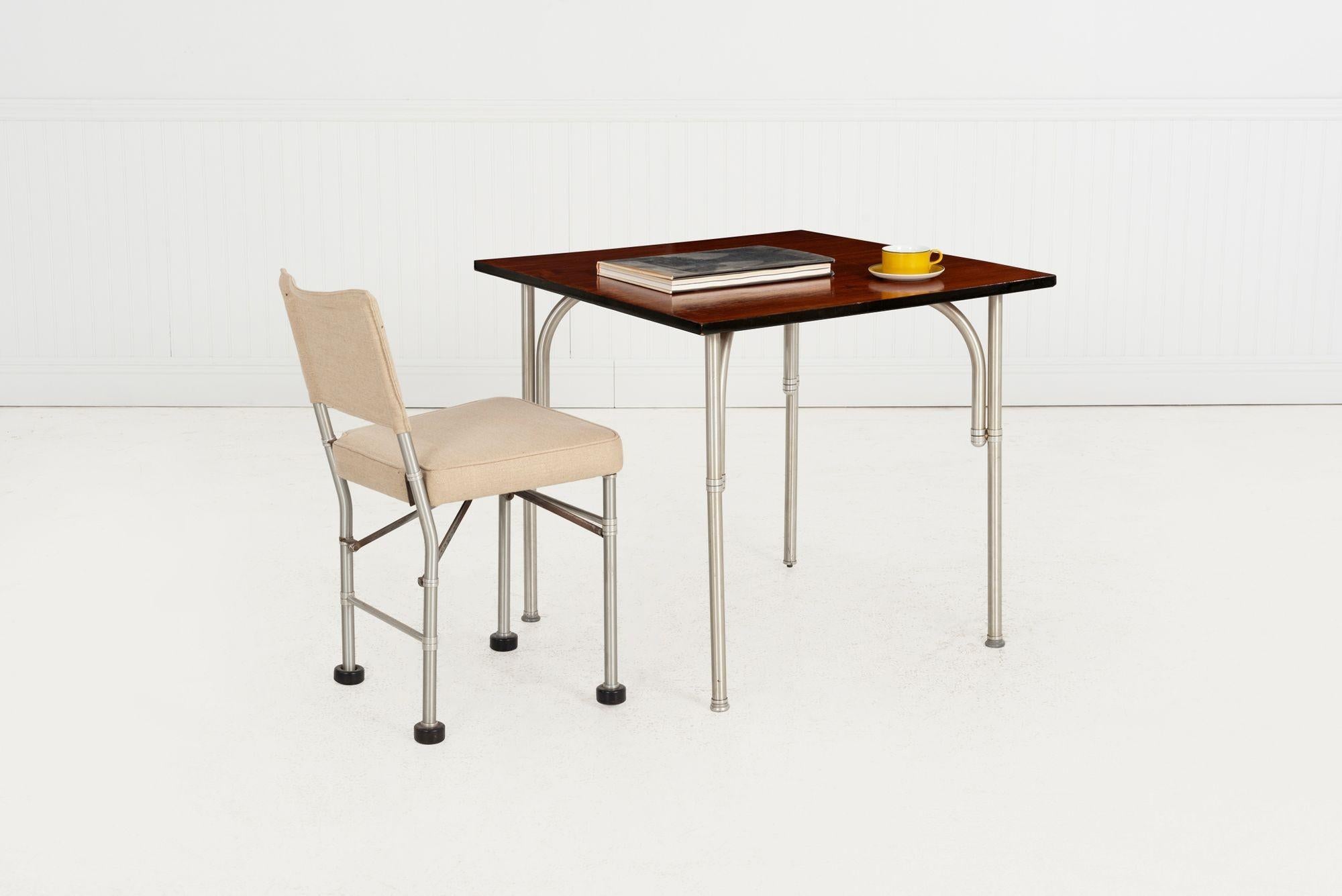 Warren McArthur Industrial Design Side Chair with Sling Back, c. 1935
Aluminum, Rubber Feet and Upholstery (cotton-poly blend)
A rare example of early American industrial design by Warren McArthur, featuring a minimal sling-back form. This uncommon
