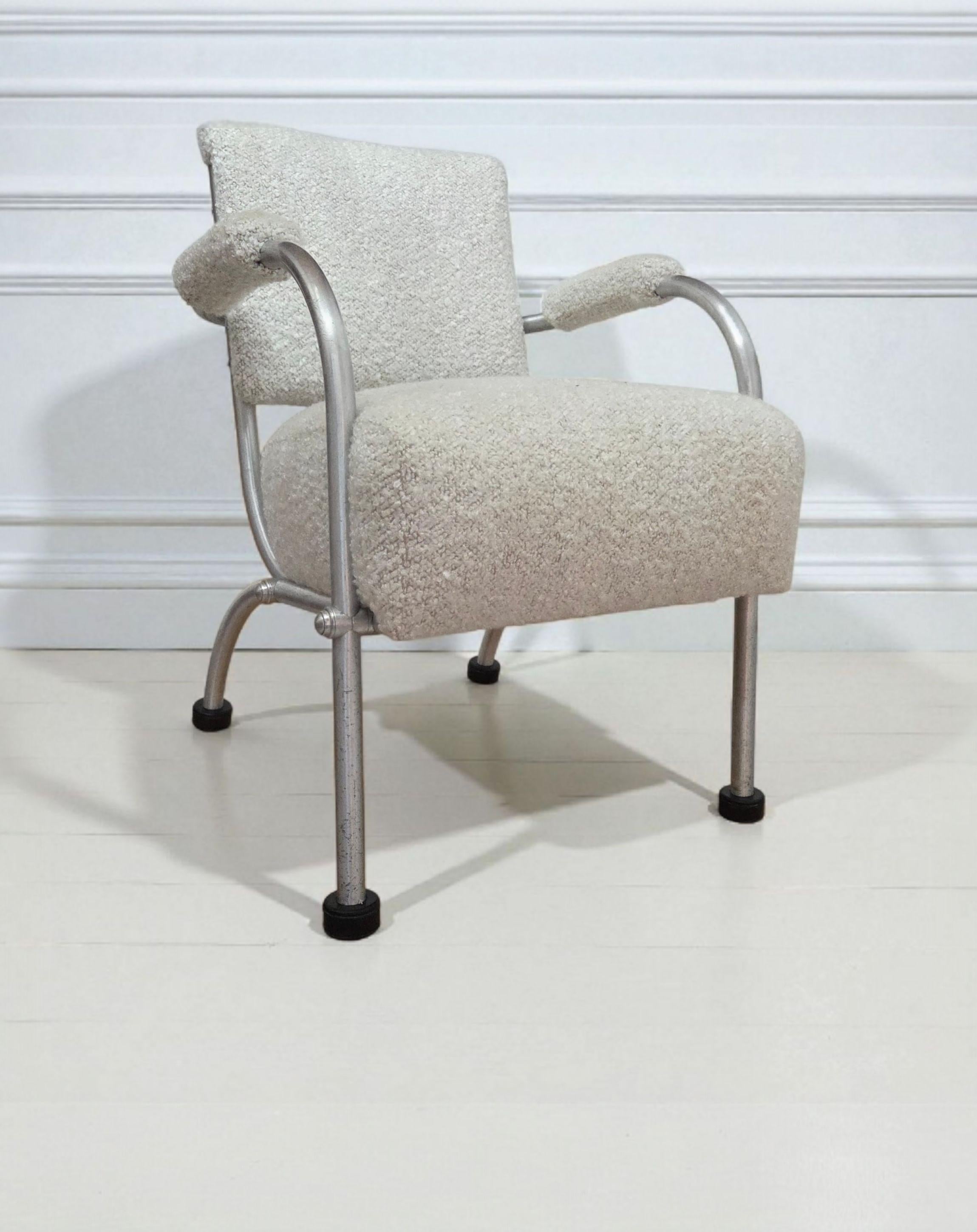 An unusual Warren McArthur lounge chair, a low version of Warren McArthur's standard Style No. 1132ASU, exemplifies the innovative engineering and modernist elegance that defined McArthur’s aluminum furniture designs of the 1930s and early 1940s.