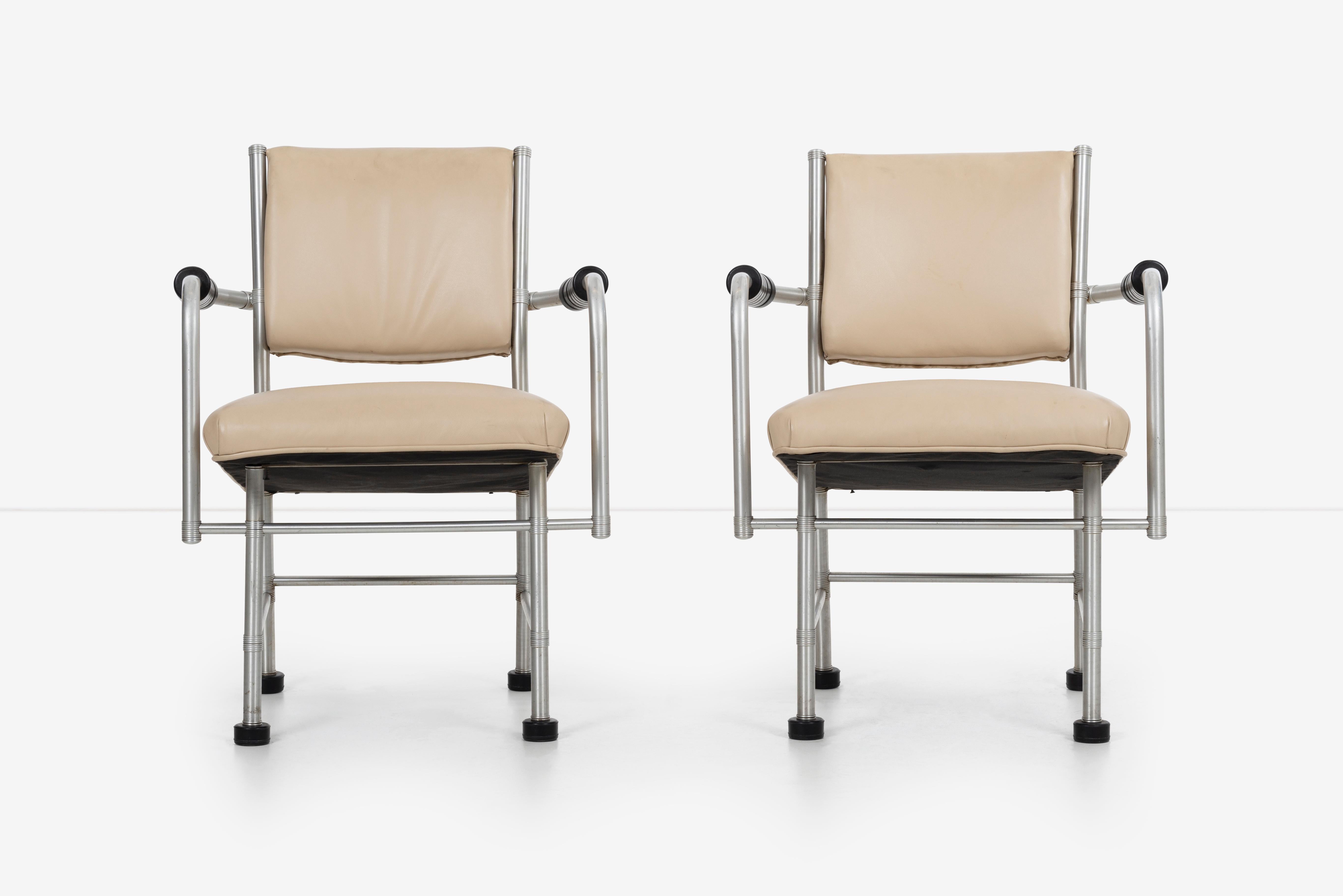 Warren McArthur pair of chairs a Revision of Sardi's chair, a collaboration with Rudolph Schindler. 
Model #1251 AR manufactured in Rome, New York in the 1930s
McArthur incorporated rubber foot pads as arm rests.
 