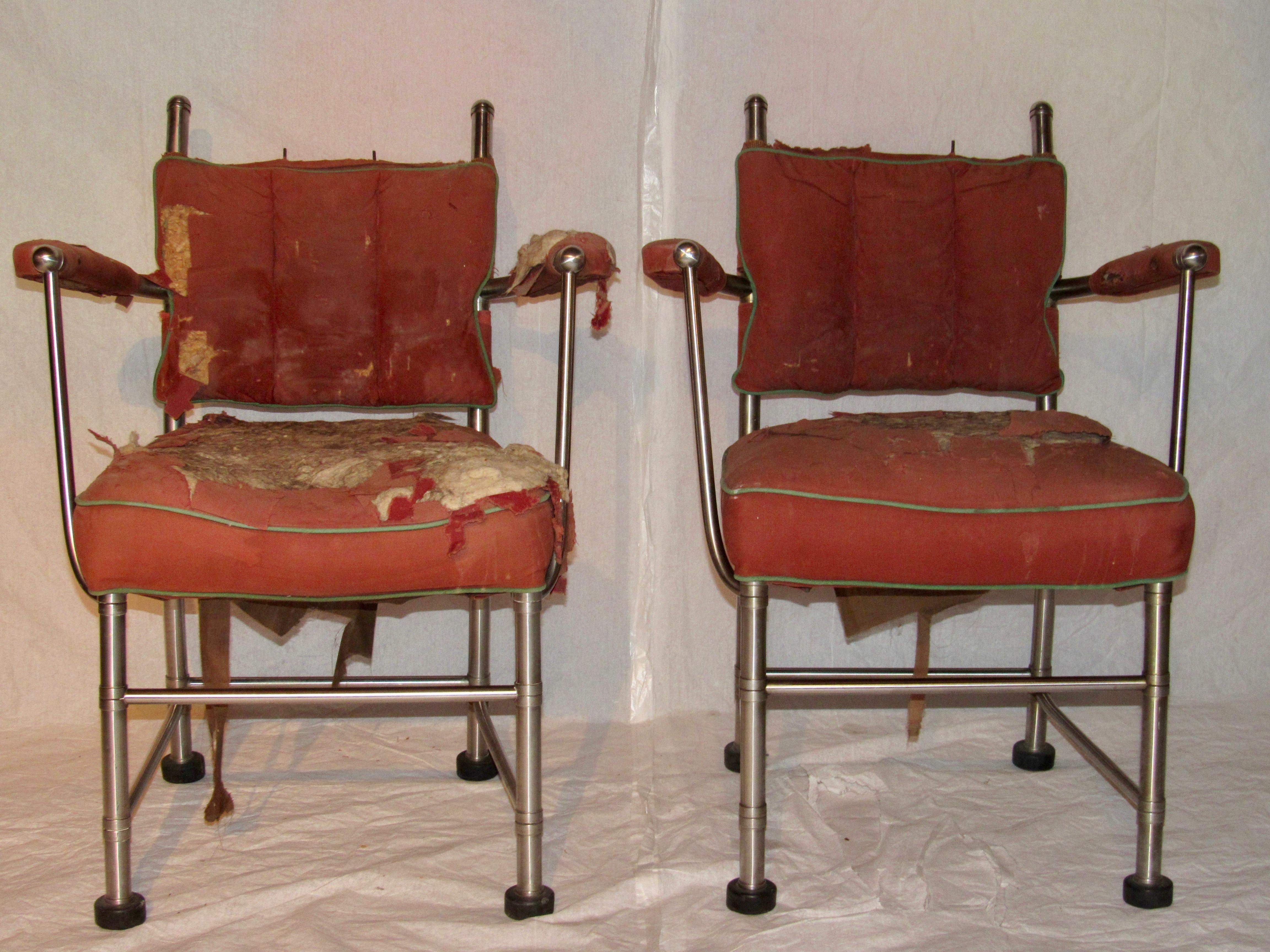 A pair of stainless steel armchairs by the Warren McArthur Corporation from the mid 1930s .  

The armchairs are Style No. 1130AU reproduced on page 3 of the  Warren McArthur Corporation Style Supplement Number One and are described as: 
