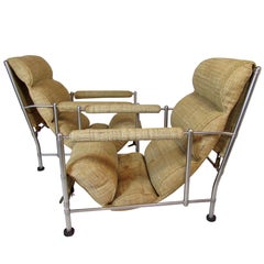 Warren McArthur Stainless Steel Lounge Chairs and Ottoman, circa 1935-1936, Pair
