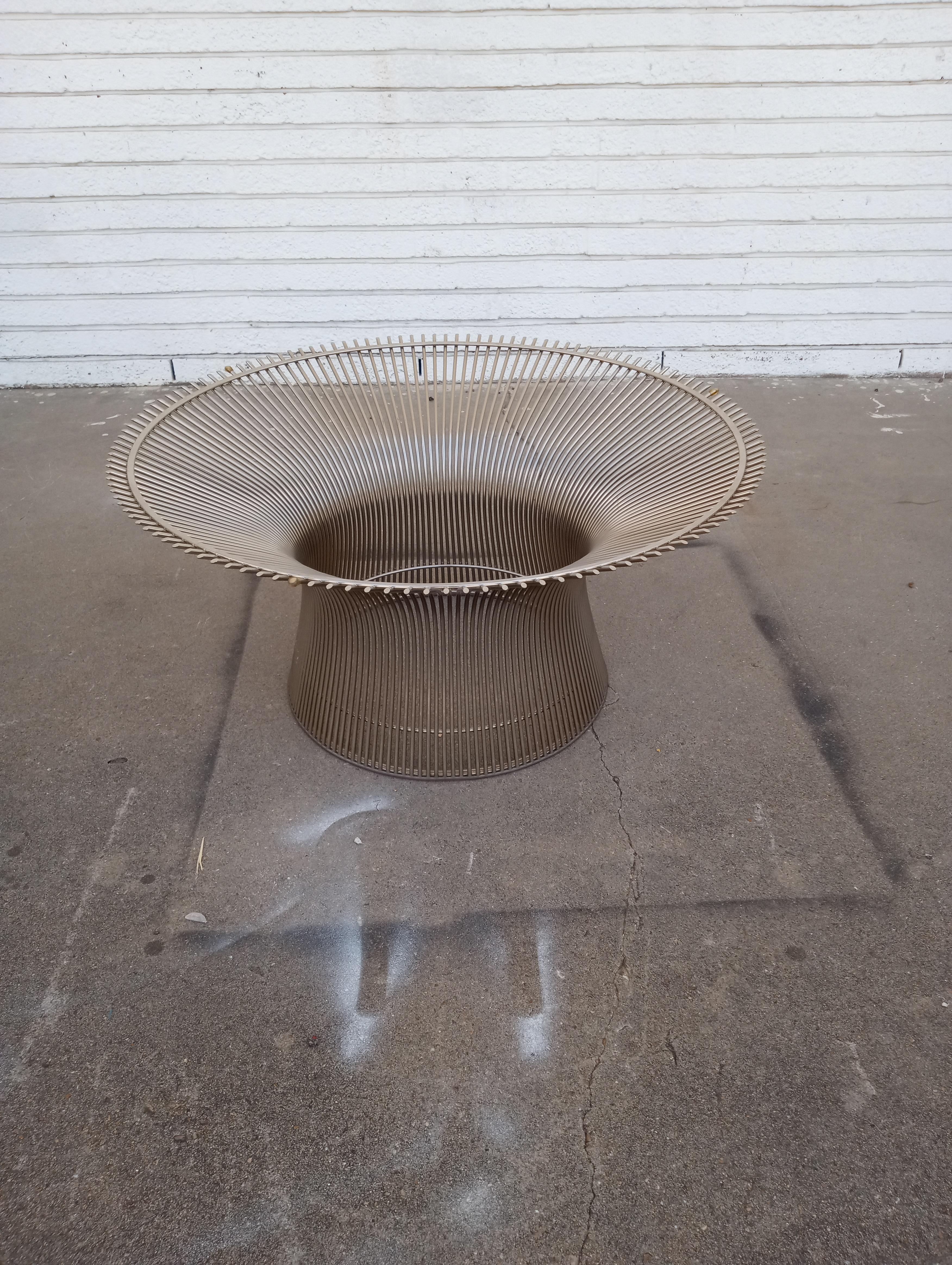 This is the iconic design by Warren Planter for Knoll Furniture. The iconic base is made of cone curved steel wire with a nickel finish.