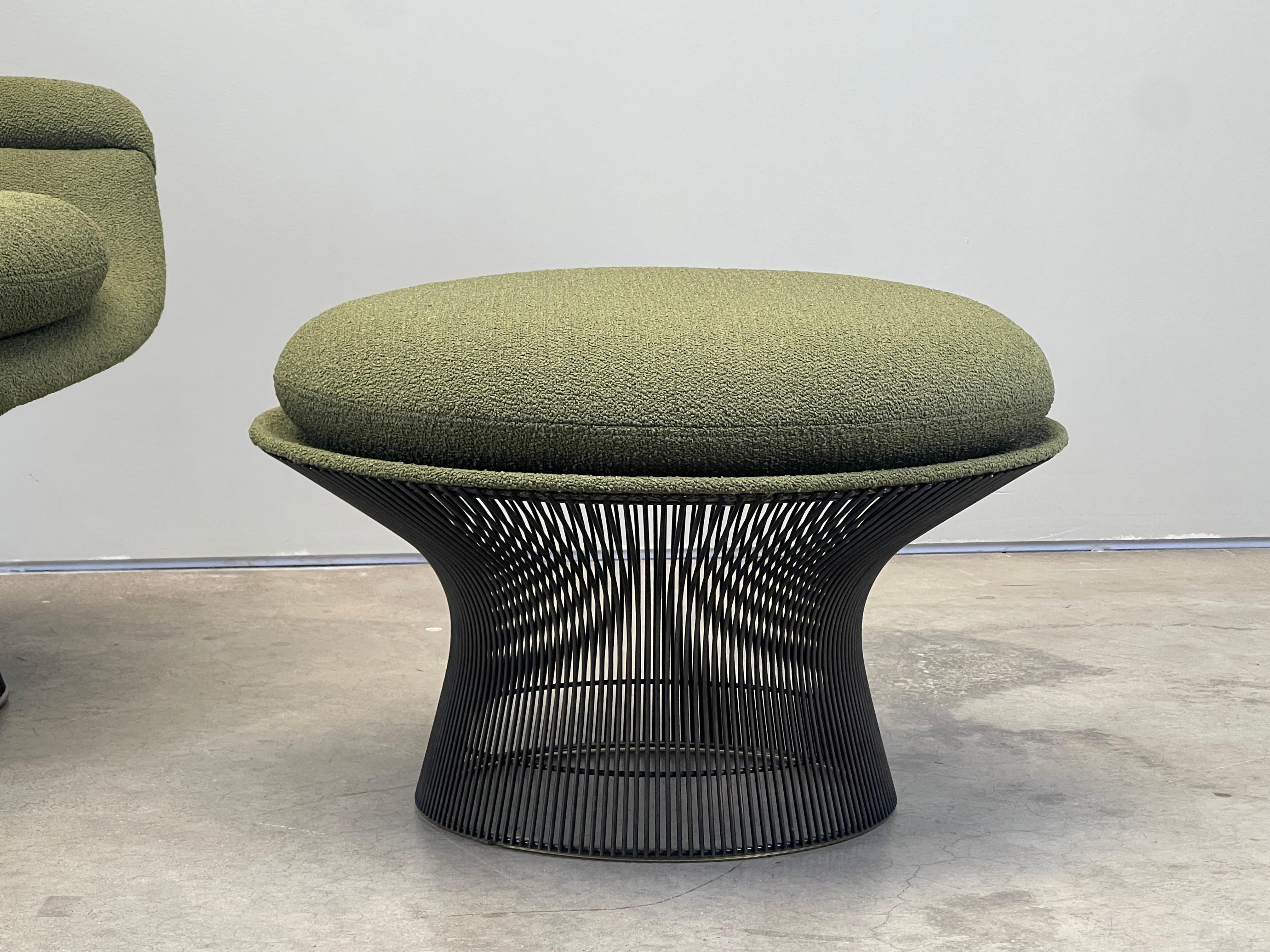 A bronze plated throne chair and ottoman designed by Warren Platner for Knoll. Reupholstered in Holly Hunt / Cuddle Up / Clover fabric. This is an early version with Patinated bronze frame. The newer versions are painted. 