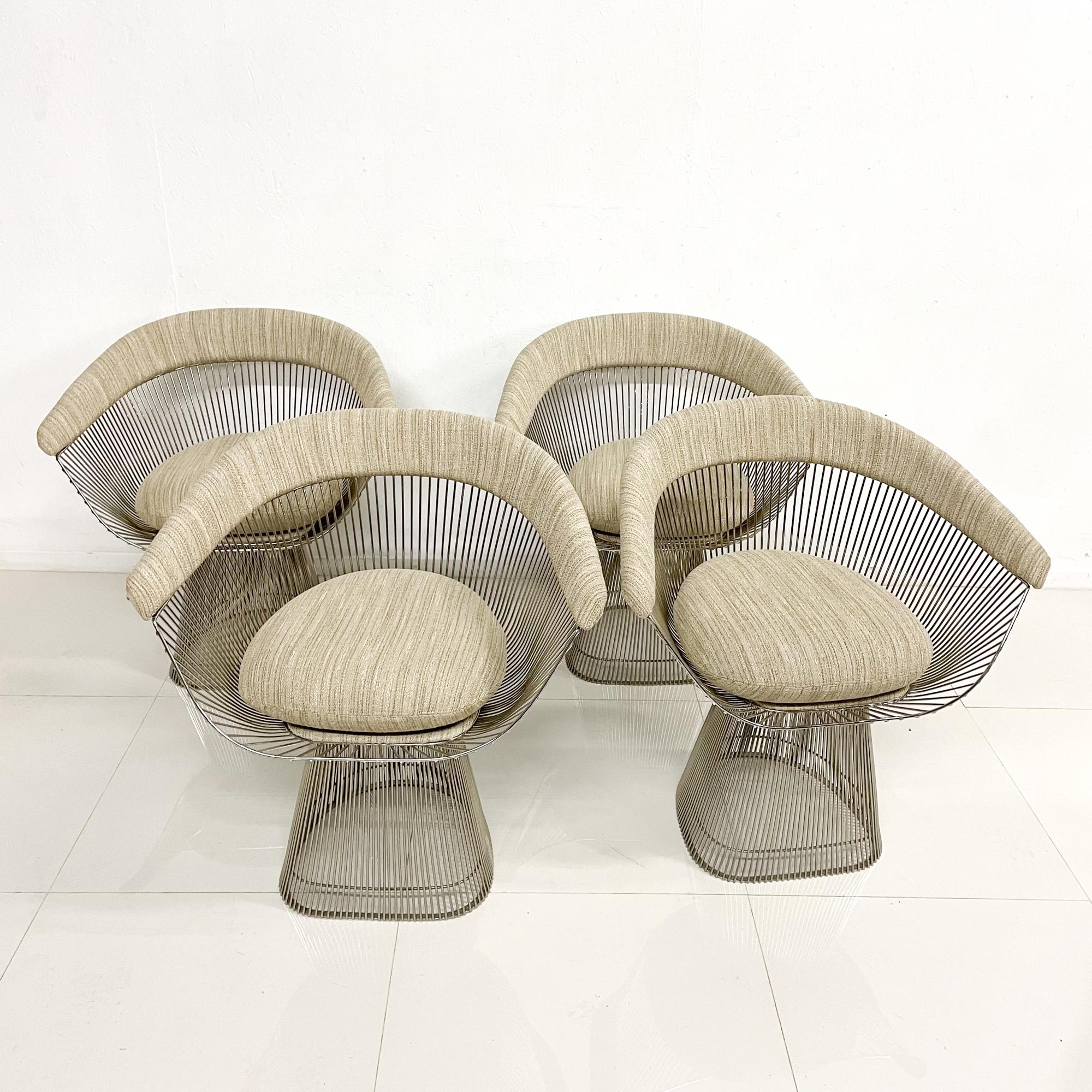 For your consideration a dining table and set of four chairs designed by Warren Platner for Knoll. Made in the USA circa the 1960s.
The set has been restored. Chairs have a new nickel plated finish with new upholstery in light tan color. All the