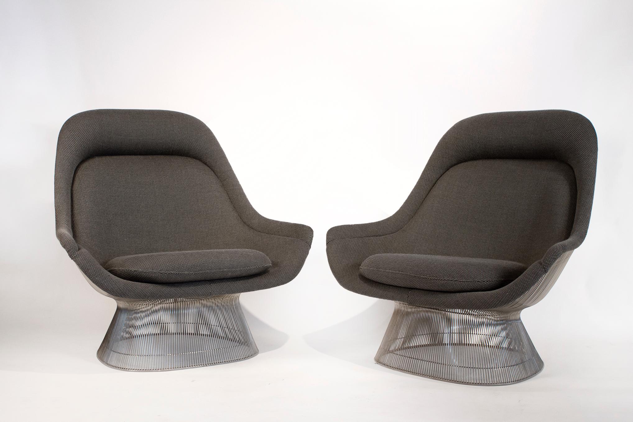 Vintage pair of high back lounge chairs designed by Warren Platner for Knoll in original wool tweed upholstery in very good condition. These chairs were sent back to Knoll about 10 years ago and were completely re-foamed and reupholstered in their